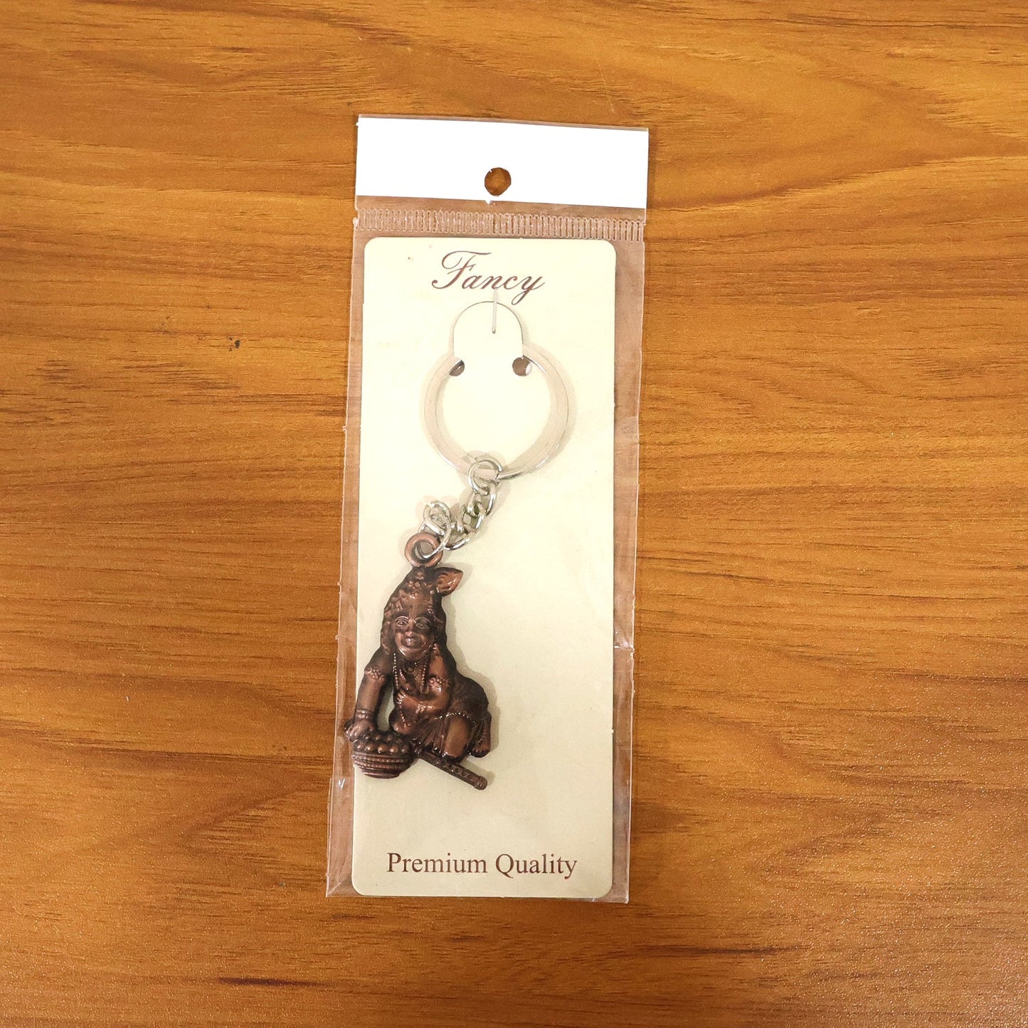 Antique gold Bal Krishna Makhan Chor keychain with sturdy chain links