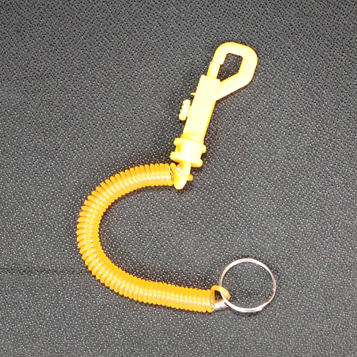 Front view of the coiled retractable keychain with a secure carabiner clip