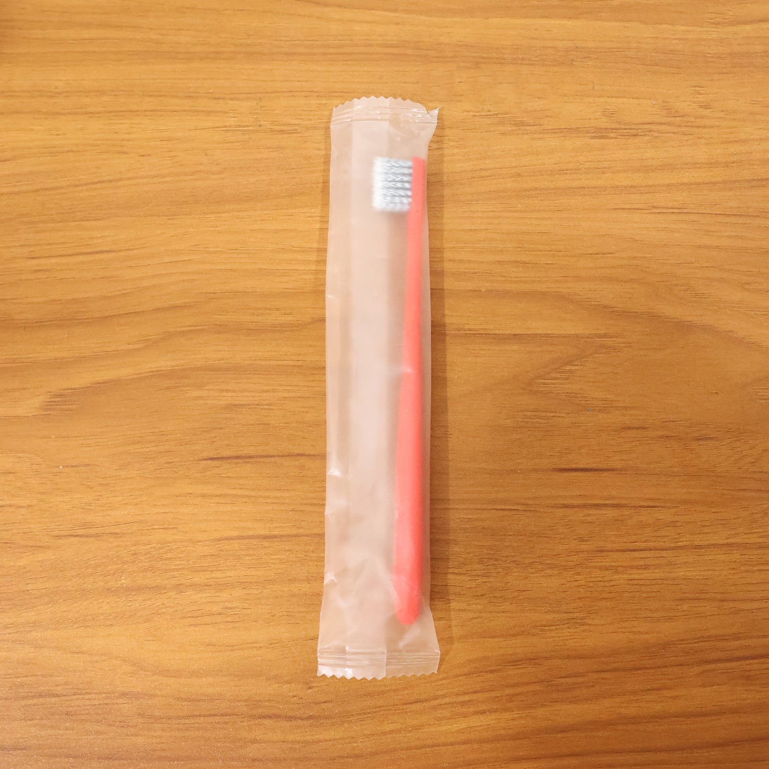 Child-friendly soft bristle toothbrush with ergonomic handle