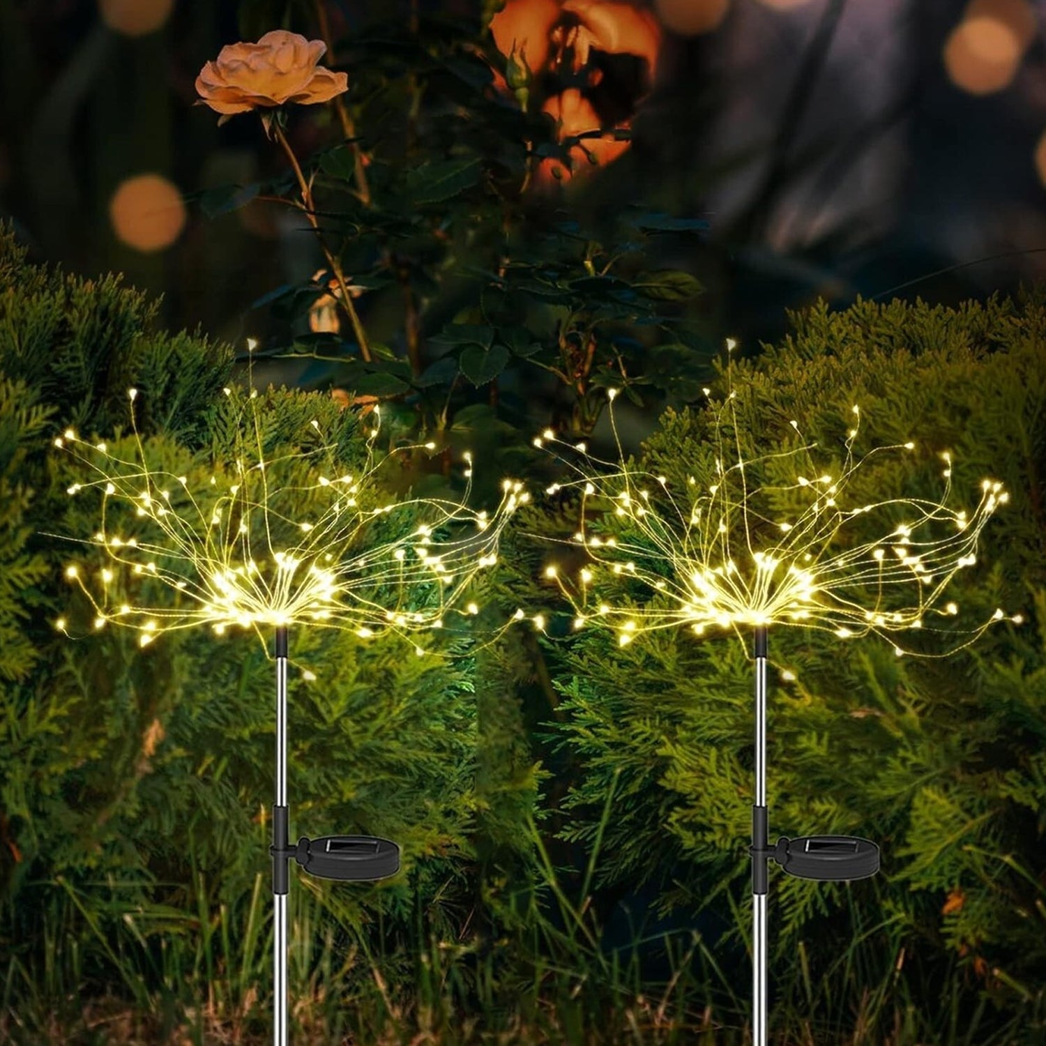 Decorative solar garden light with flexible branches in a starburst firework style
