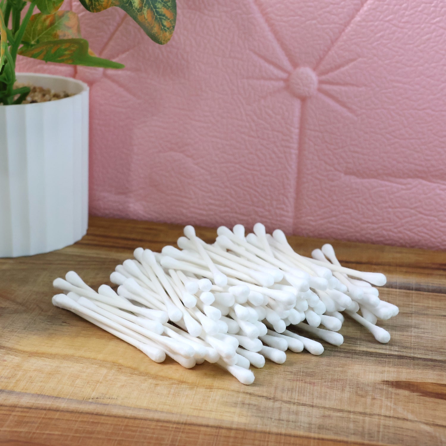 Soft dual-tipped cotton swabs laid out to show gentle tips and paper stem