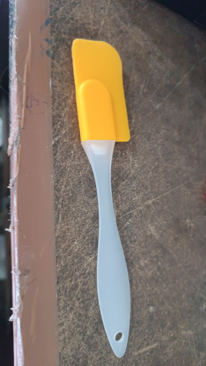 Vertical view showing the slim and compact design of silicone cooking spatula