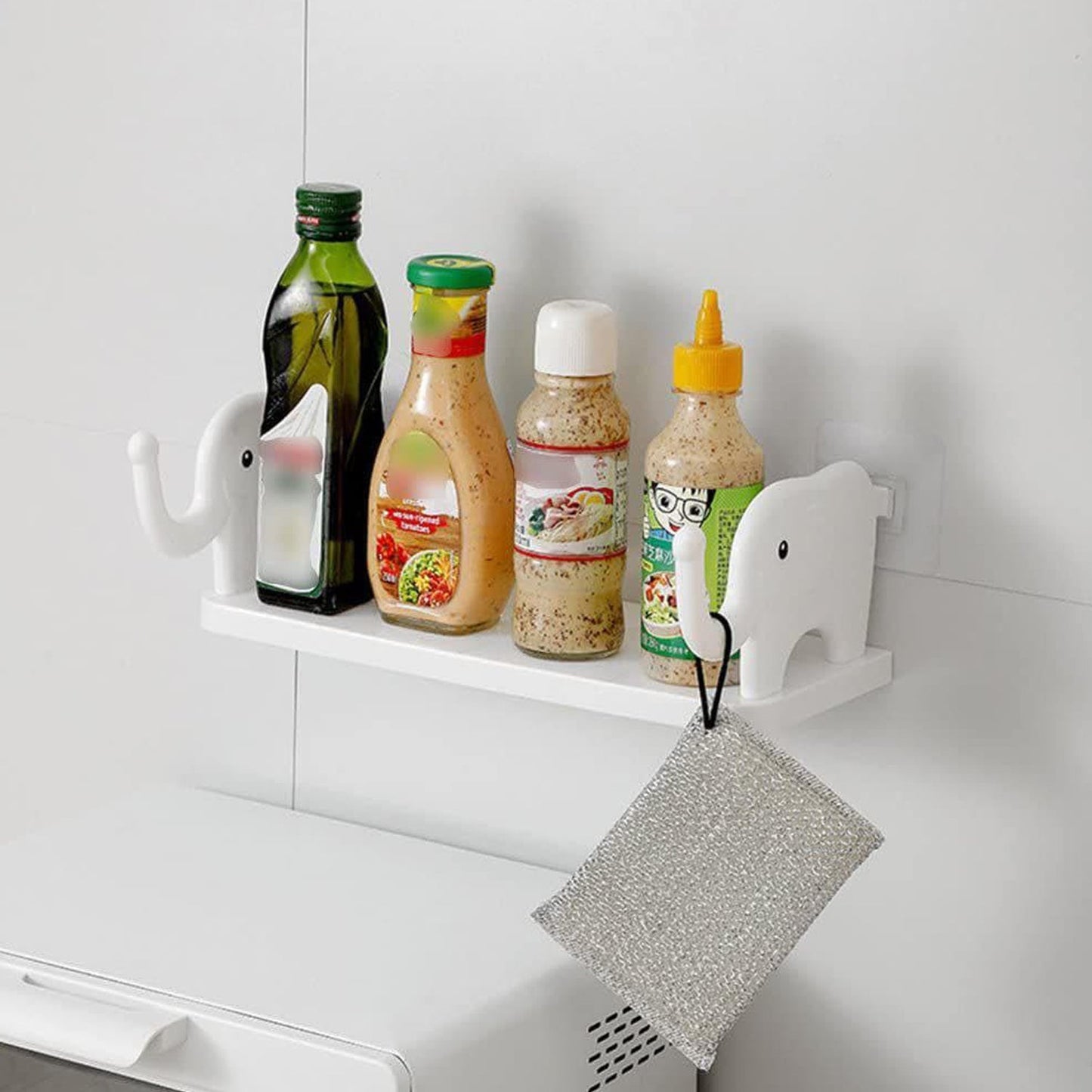 No-punch elephant wall shelf providing storage in a modern bathroom.