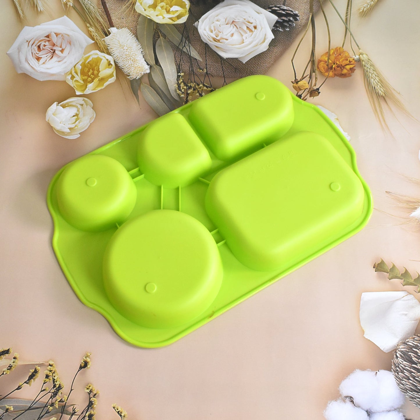 Stack of durable, colorful 5-compartment plates ready for use.