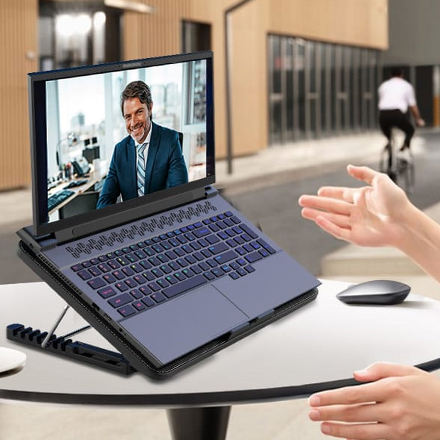 Close-up of the laptop cooling pad's dual USB ports and power connection.