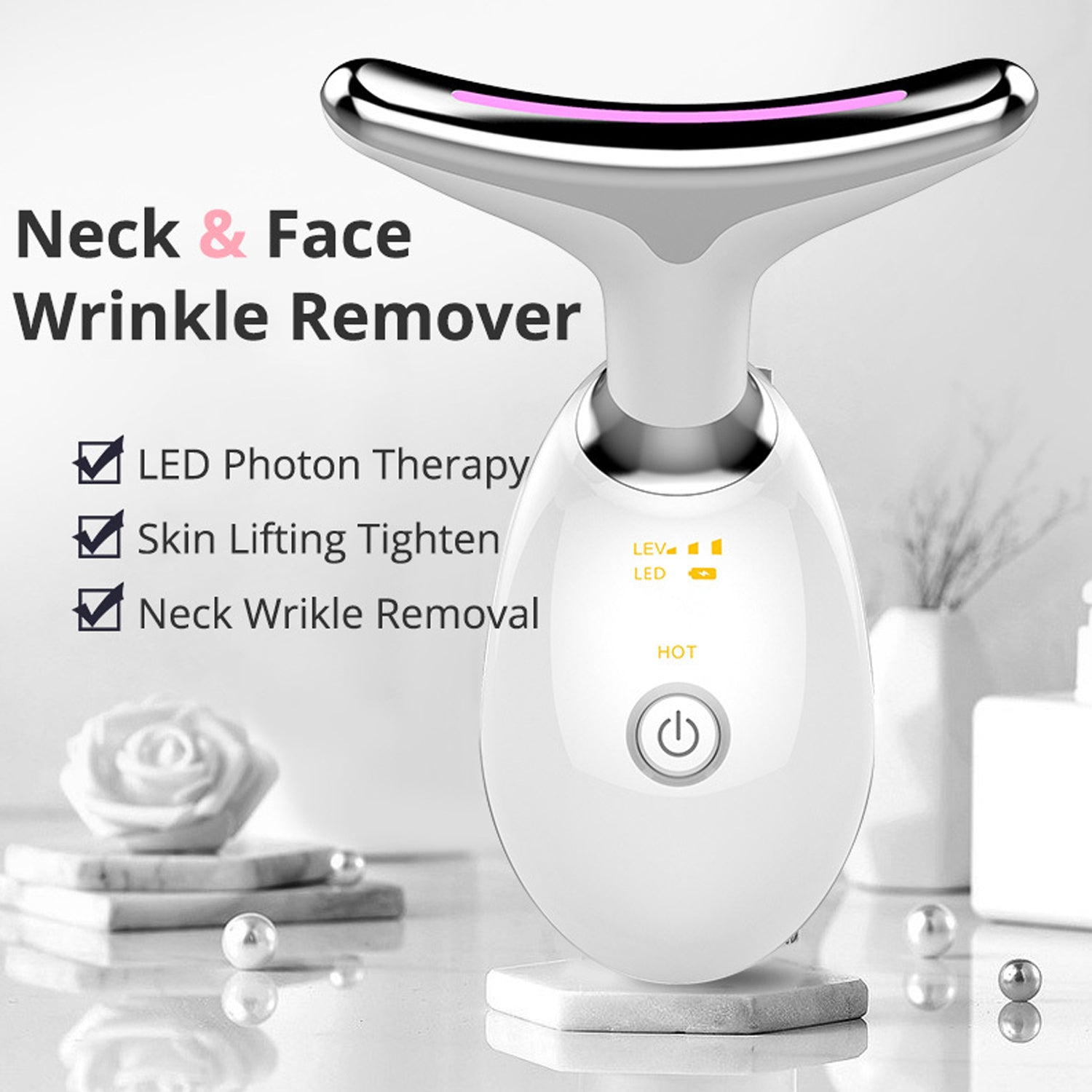 Electric face massager with LED lights in hand