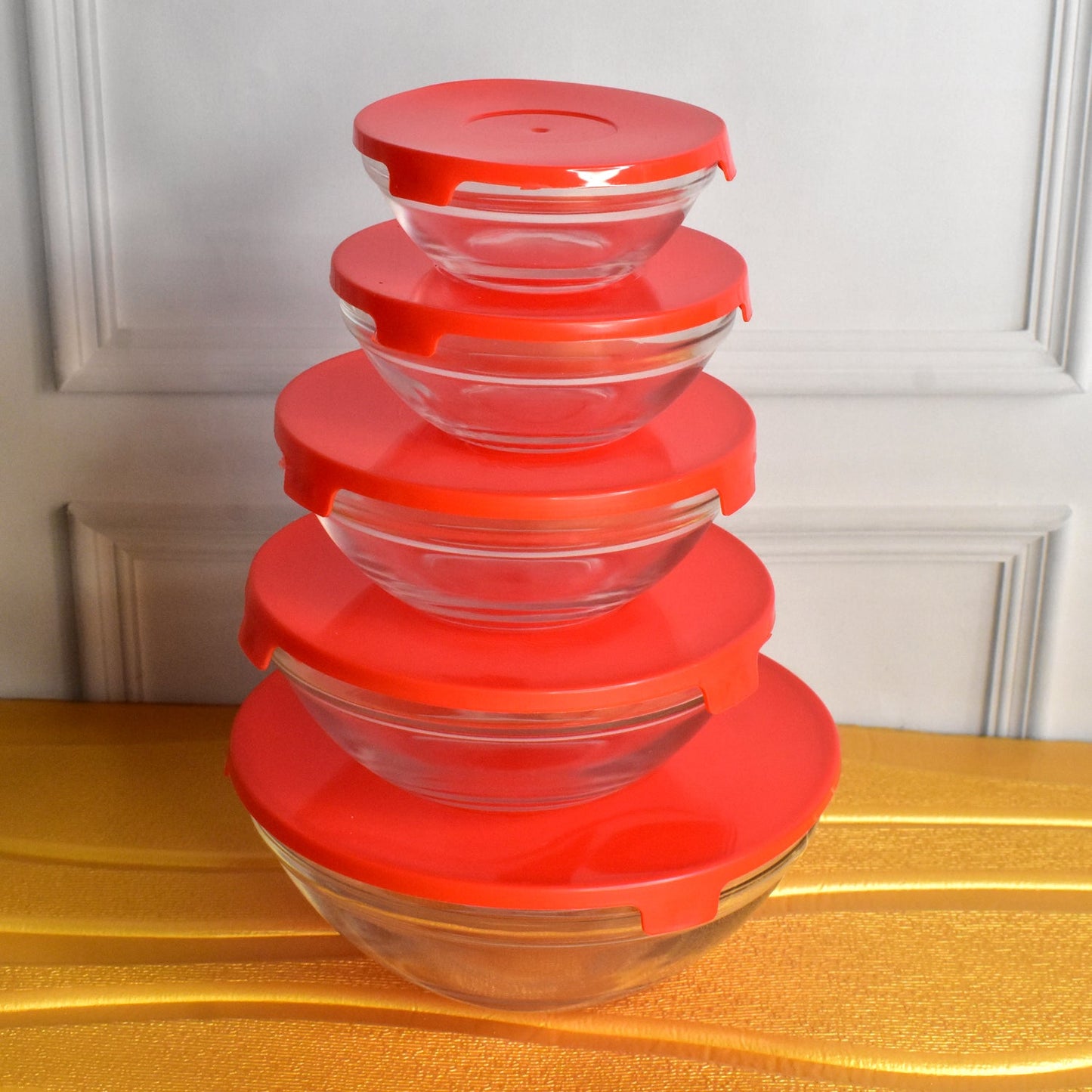 Organivo glass bowls stacked neatly, demonstrating their space-saving design for kitchen storage.