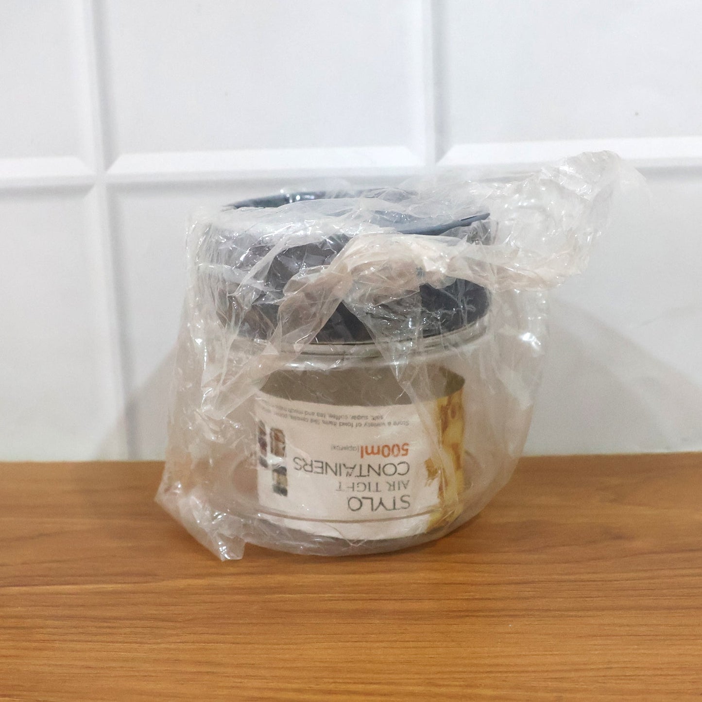 Clear kitchen storage container with tight-fitting airtight lid