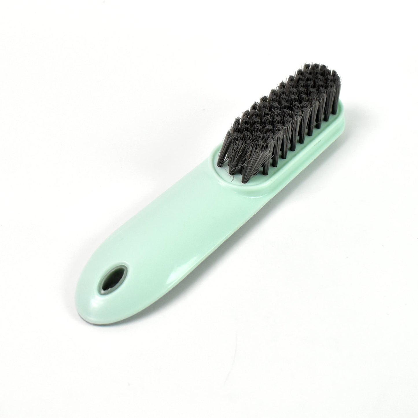 The versatile household scrubber shown with water, ready for deep cleaning.