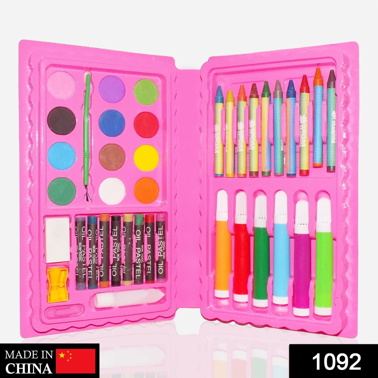 Open Kids Art Kit displaying crayons, watercolor cakes, sketch pens, and accessories.