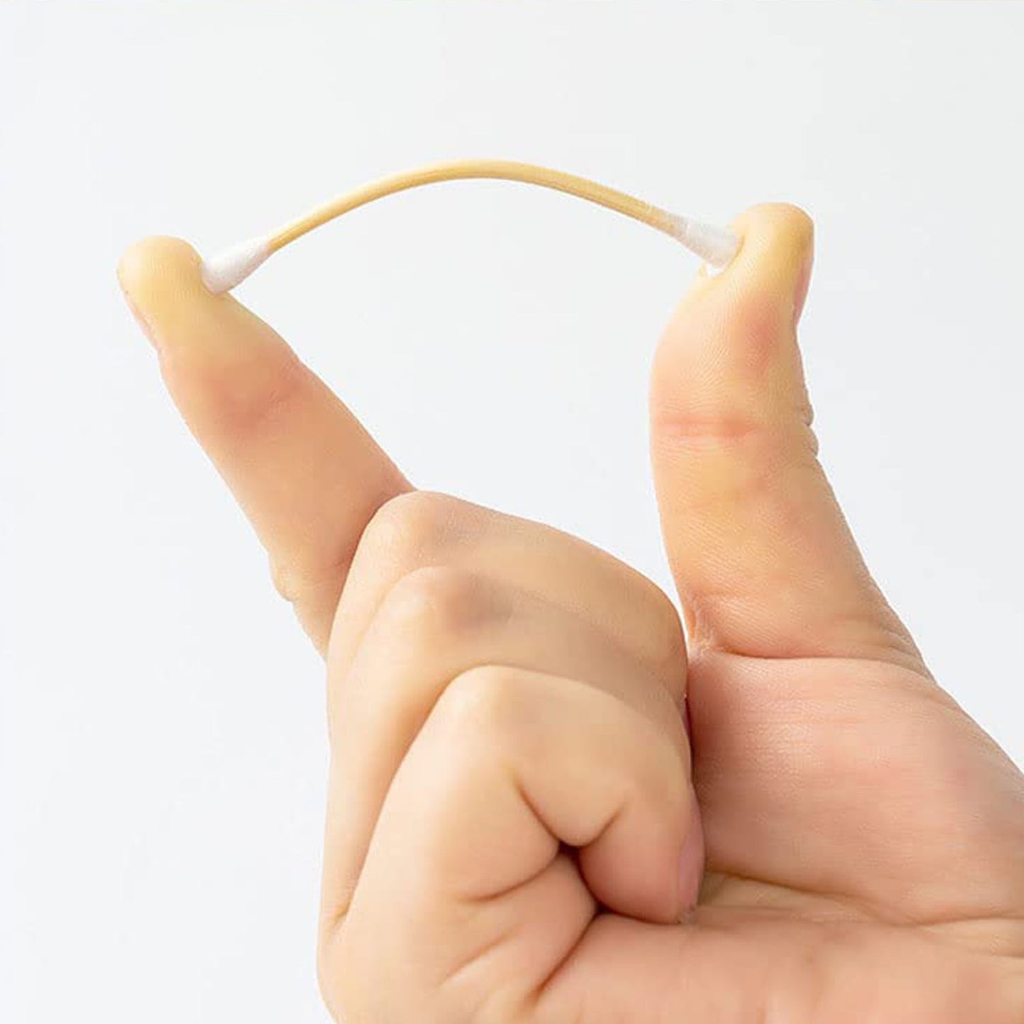 Double-headed bamboo cotton swabs shown up close.