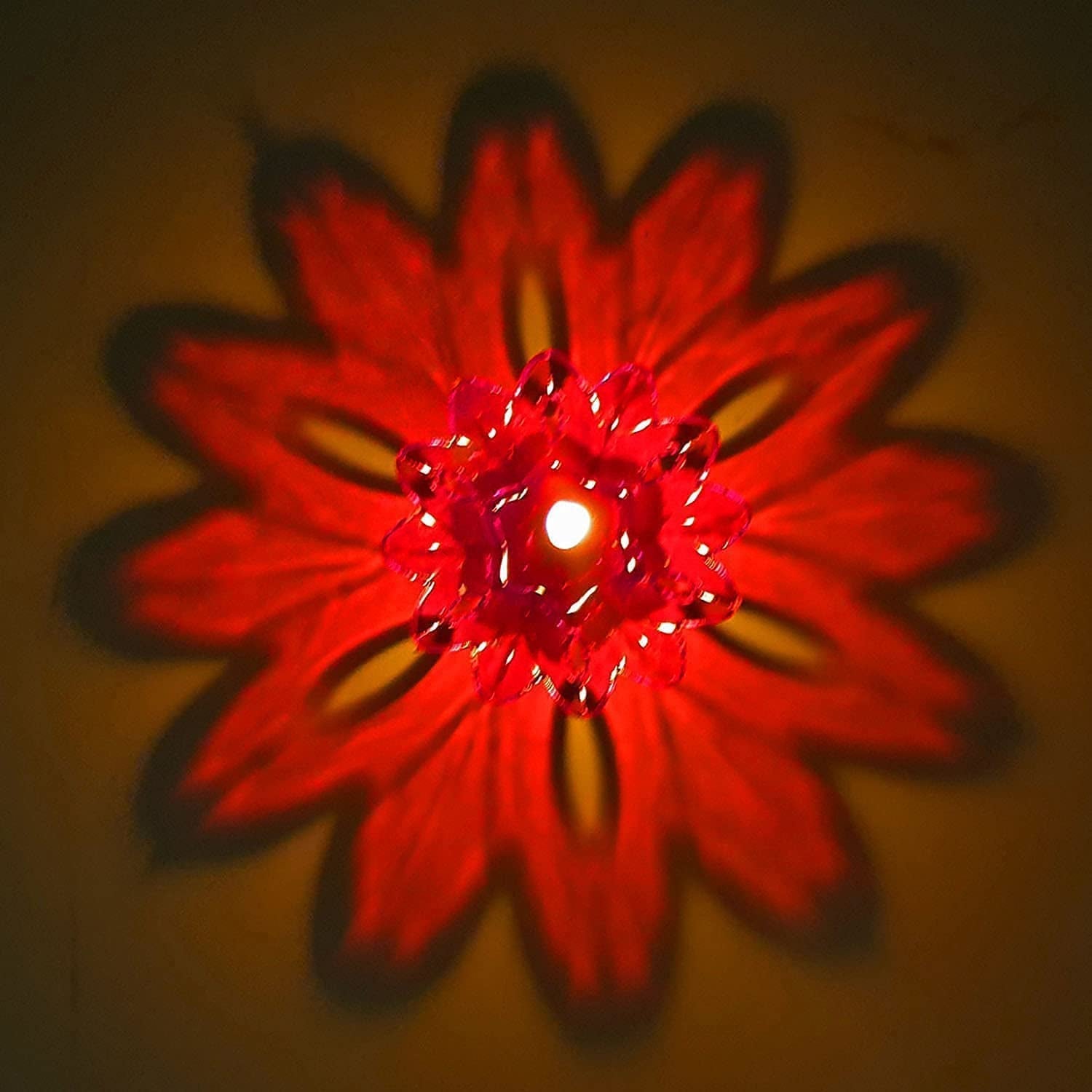 Overhead view of the 12-piece Diwali candle holders in various hues.