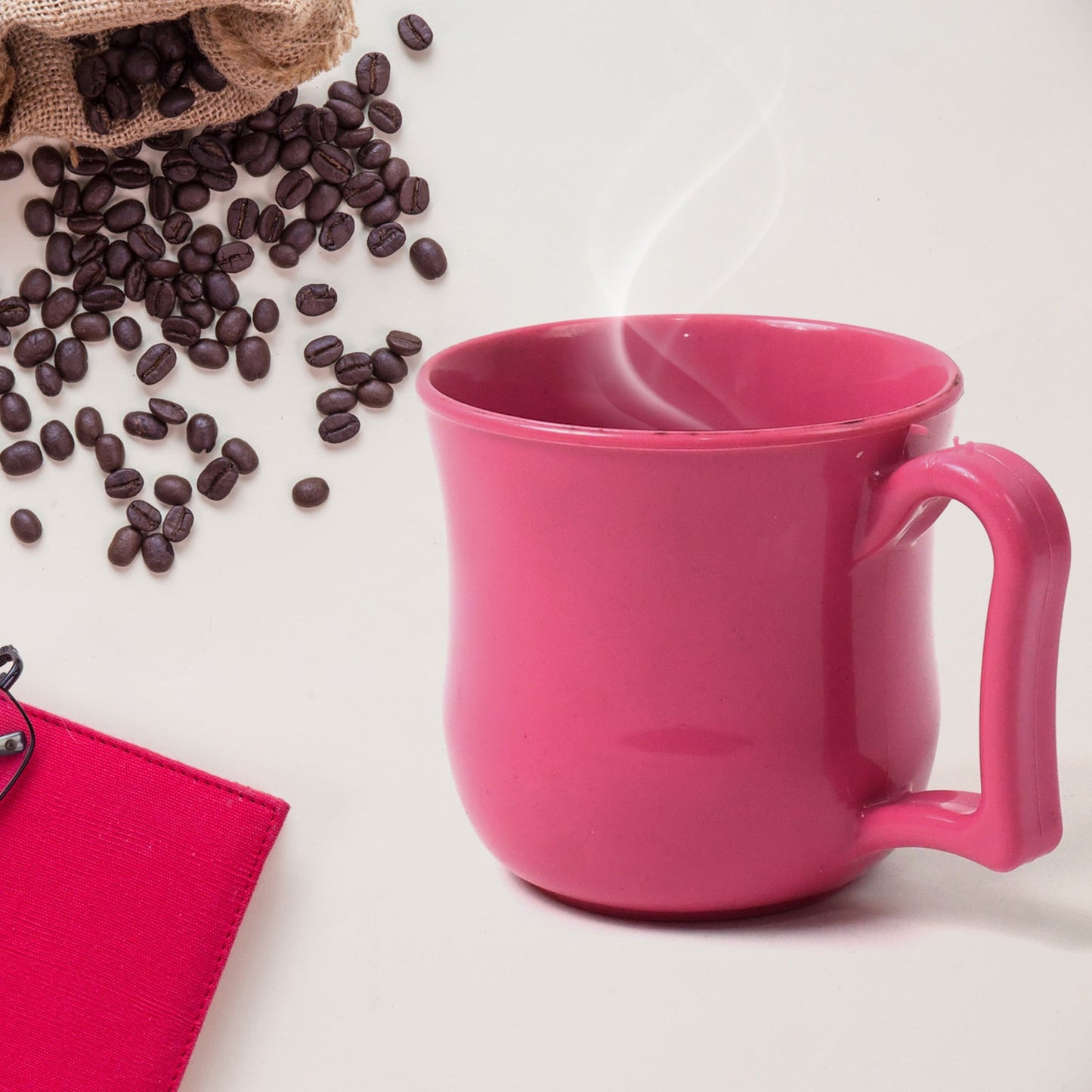 Overhead shot of a plastic mug, emphasizing its wide opening suitable for easy cleaning.