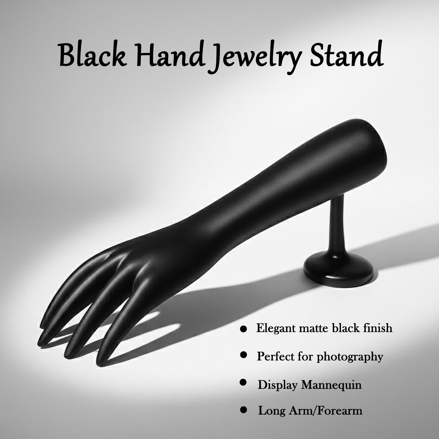 Palm side of black hand-shaped jewelry organizer stand