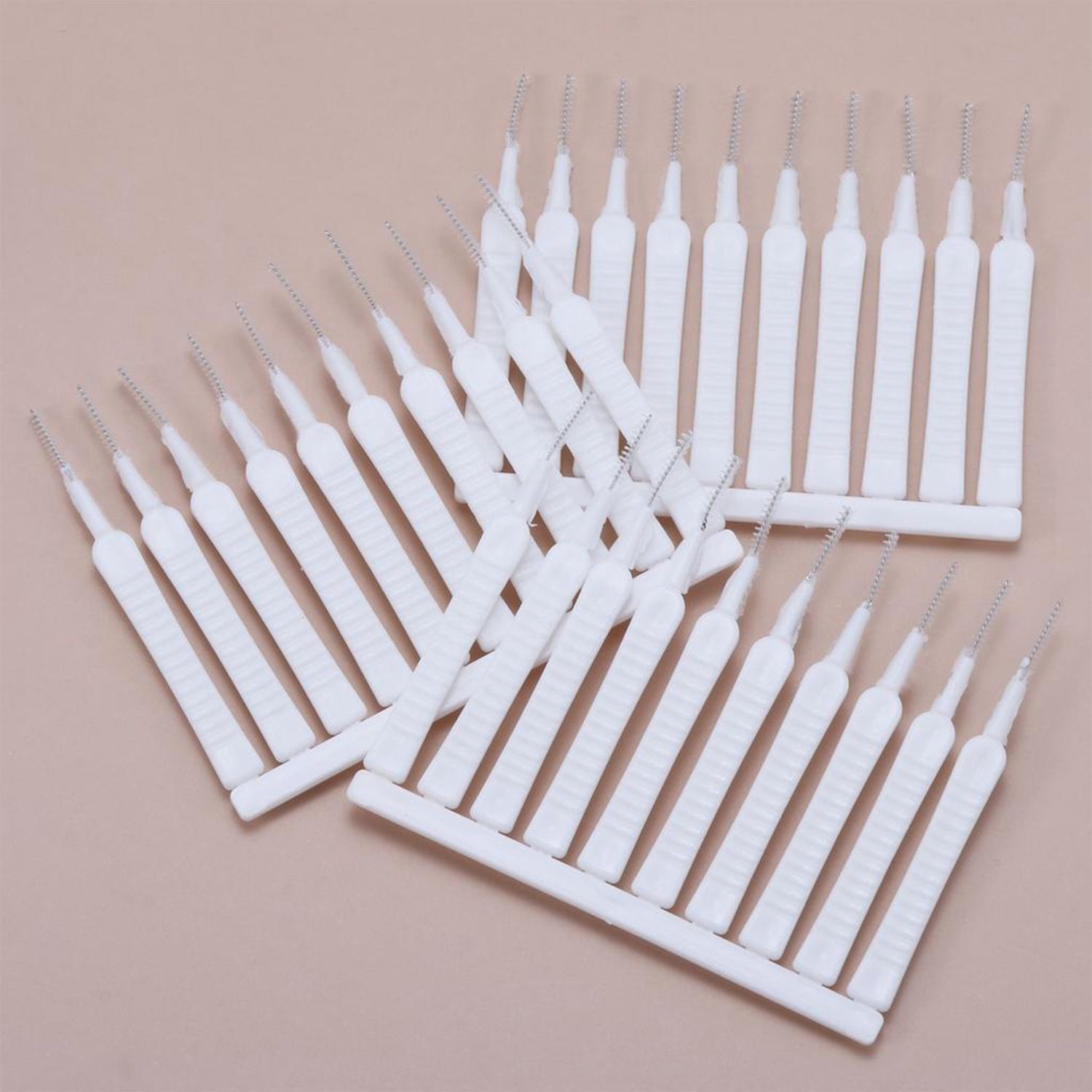 The shower head cleaning brush set displayed with a focus on its ergonomic handle.