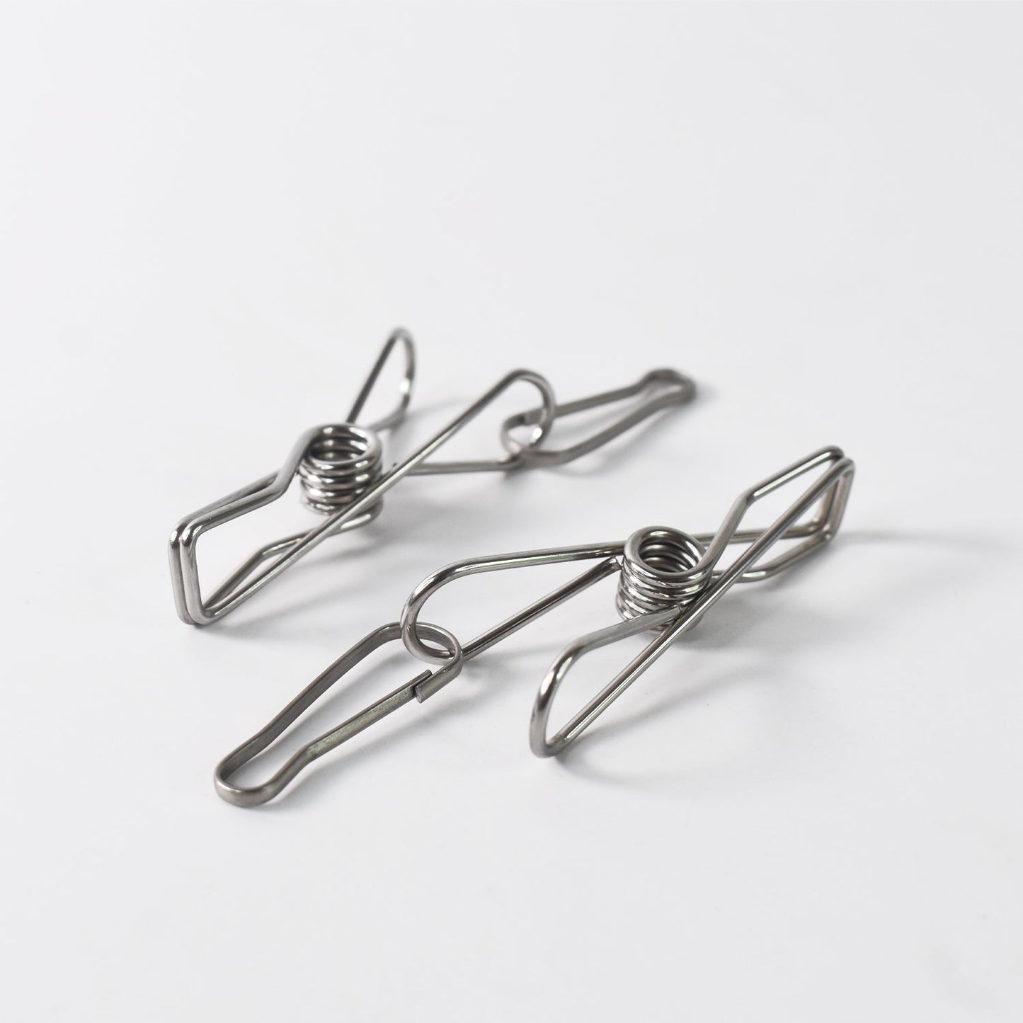 Durable stainless steel clothes pegs holding clothes securely