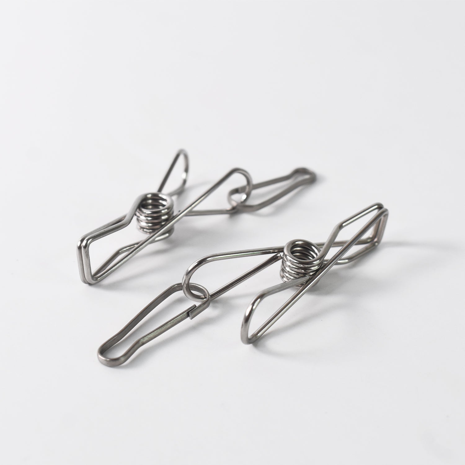 Durable stainless steel clothes pegs holding clothes securely