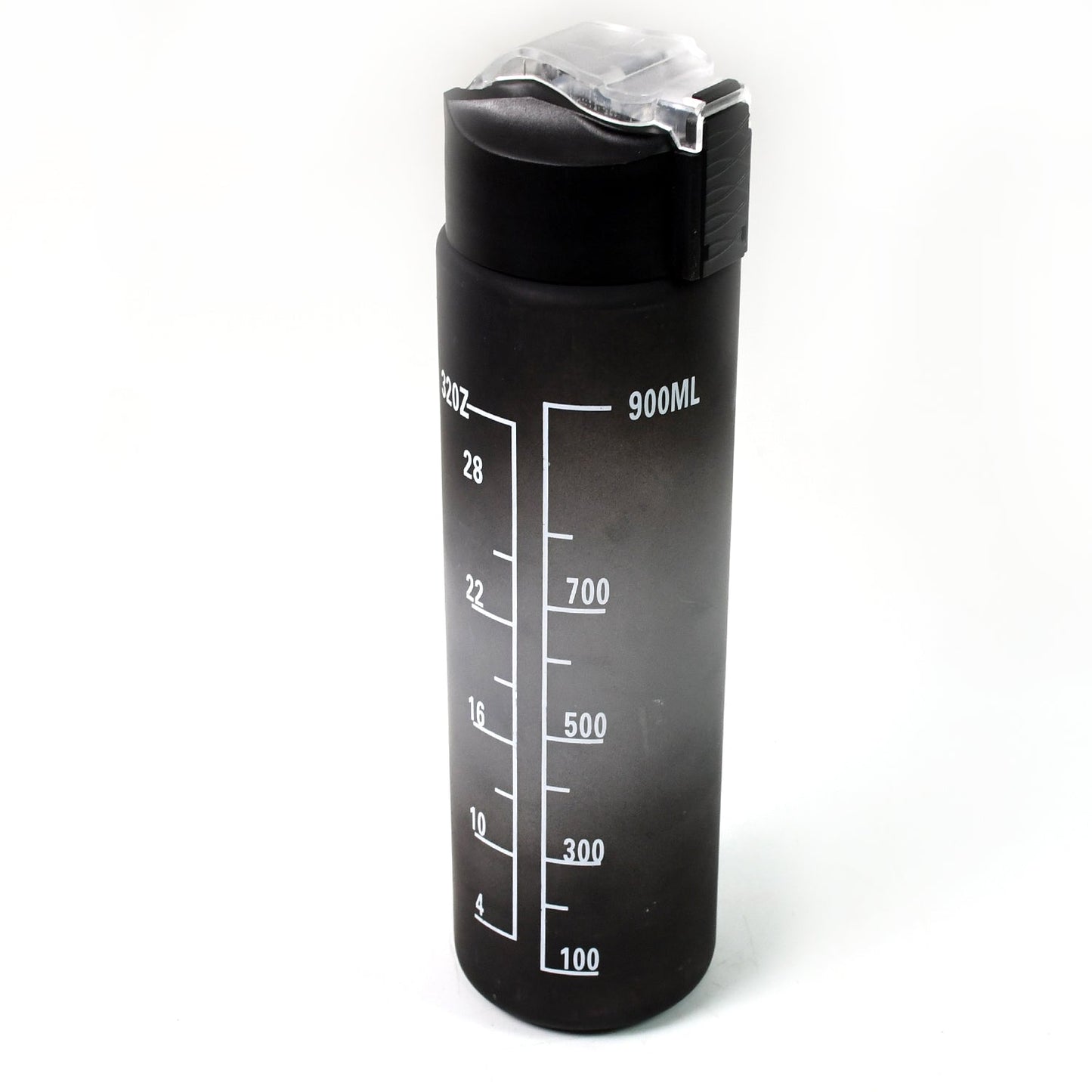 Person holding the sleek black motivational water bottle during a workout session.