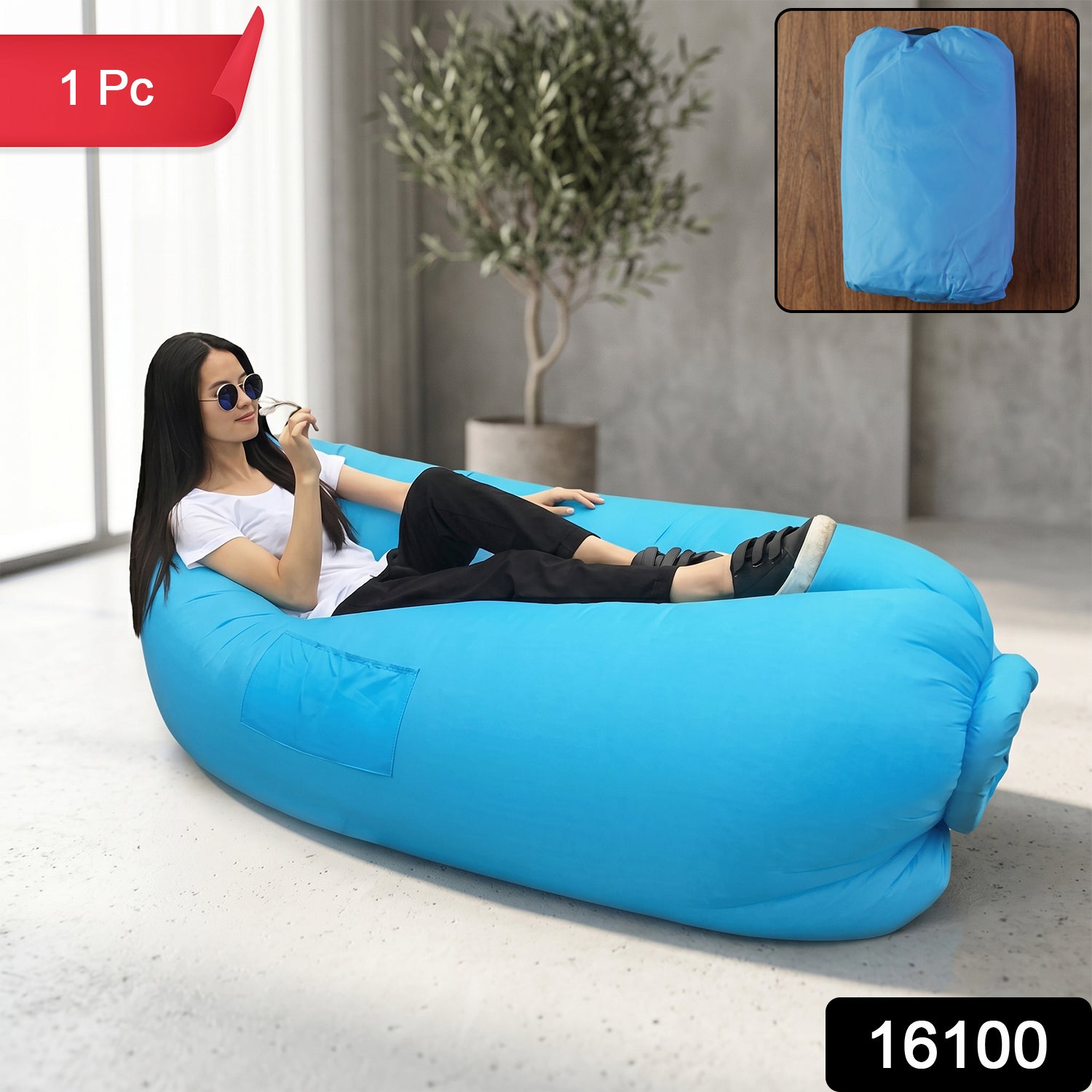Person lounging on portable inflatable air sofa during outdoor activity