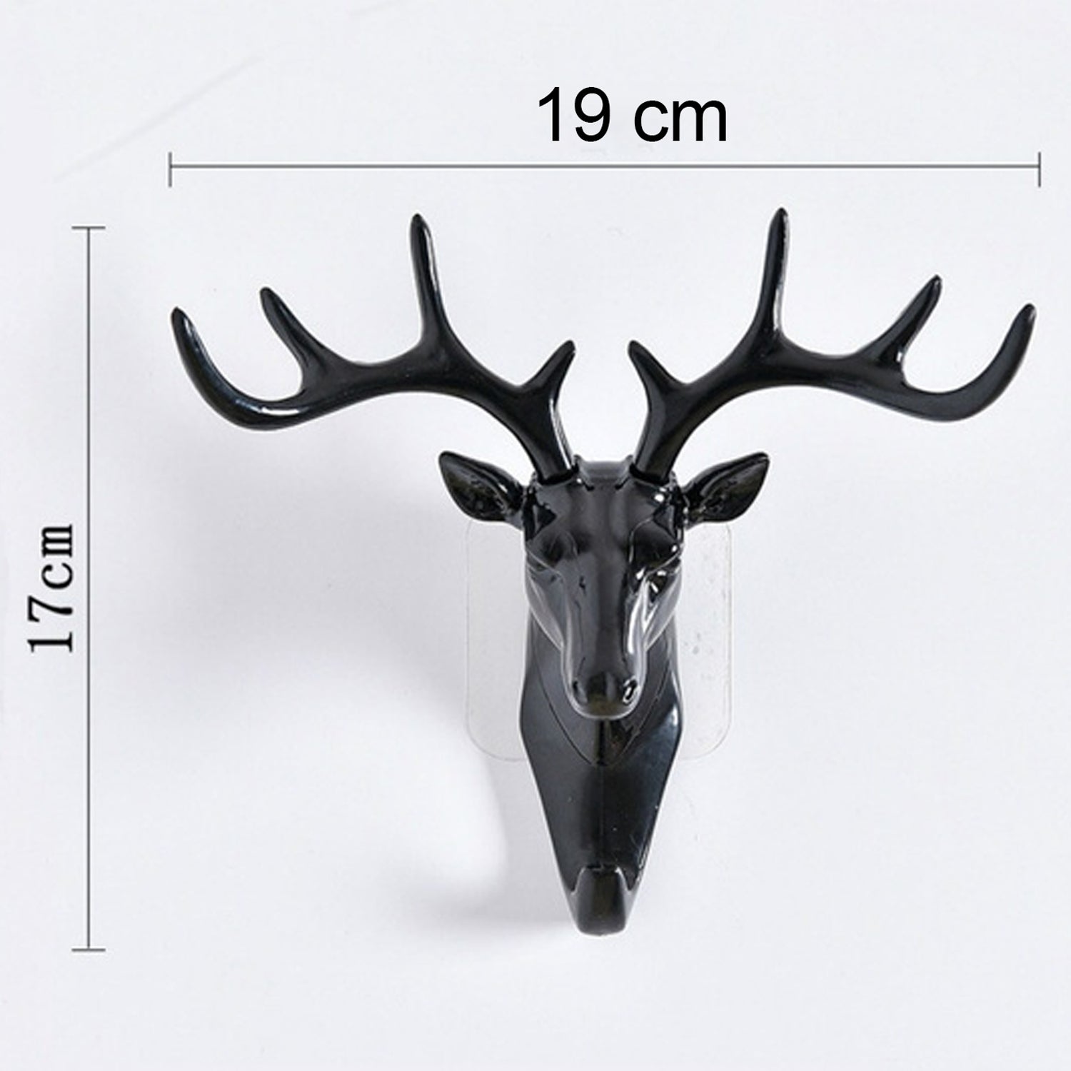 Stylish deer head hook in grey, functioning as a decorative hanger for a hat.