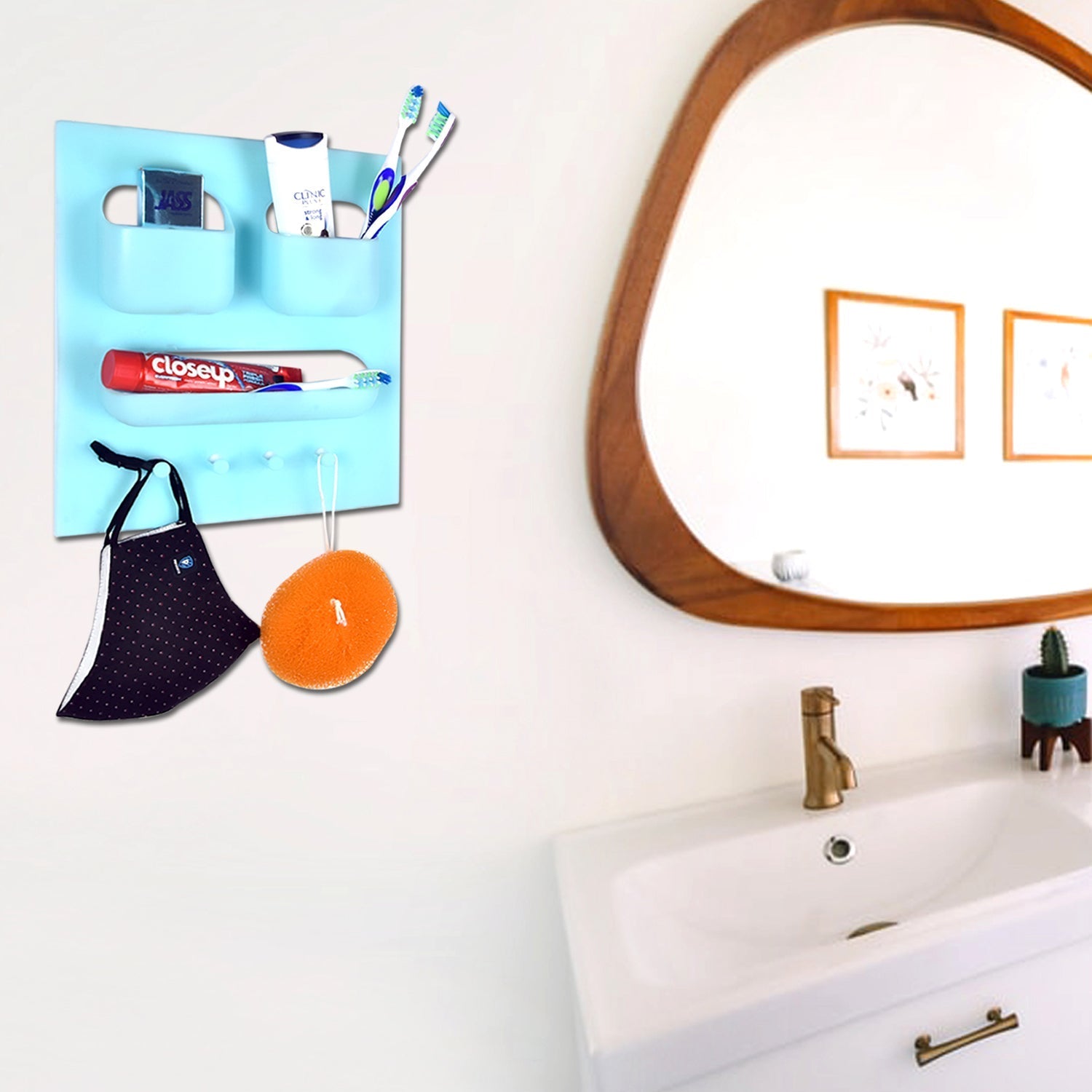 Functional wall-mounted organizer for soap, toothpaste, and multiple toothbrushes.