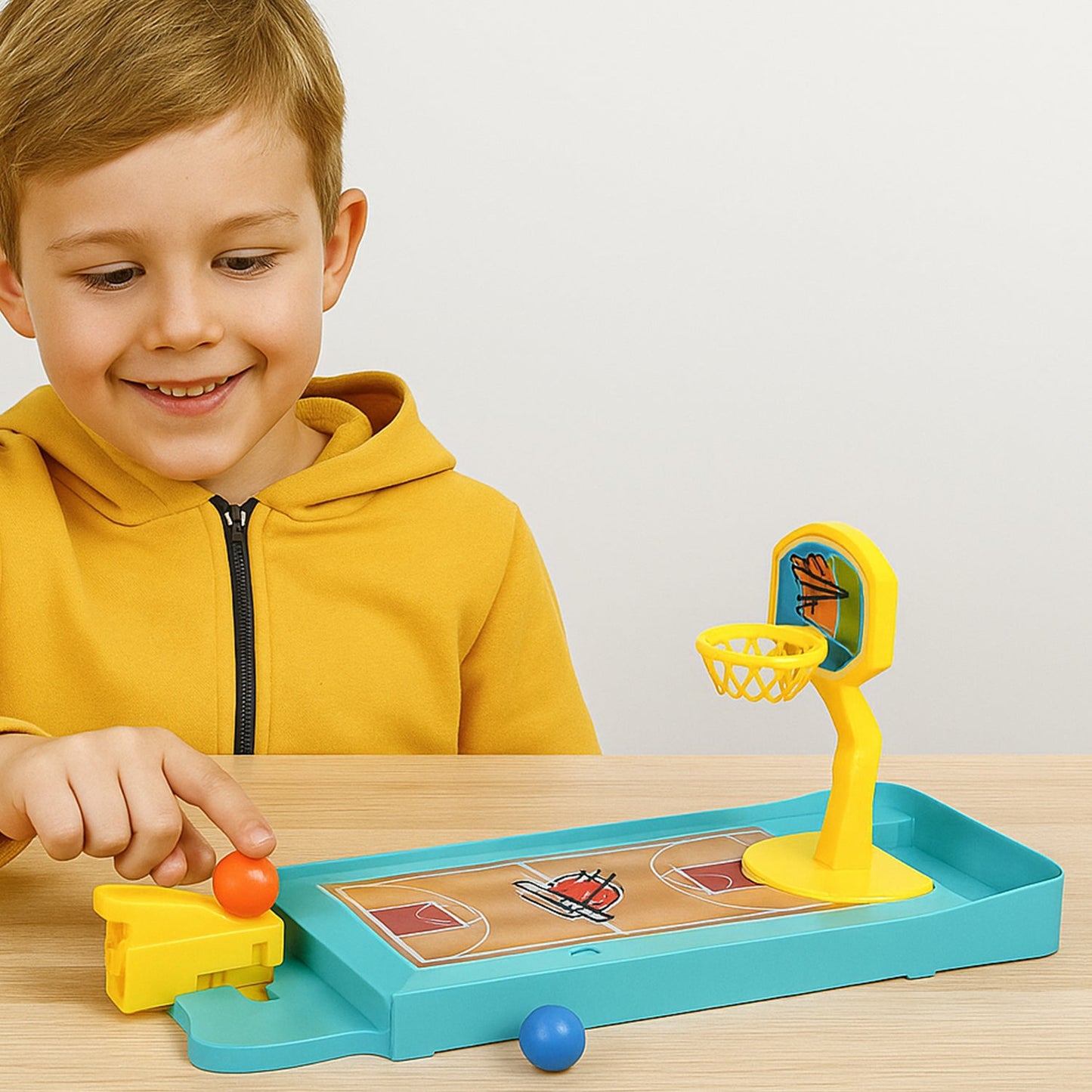 A vibrant Mini Finger Basketball Game set ready for play on a table.