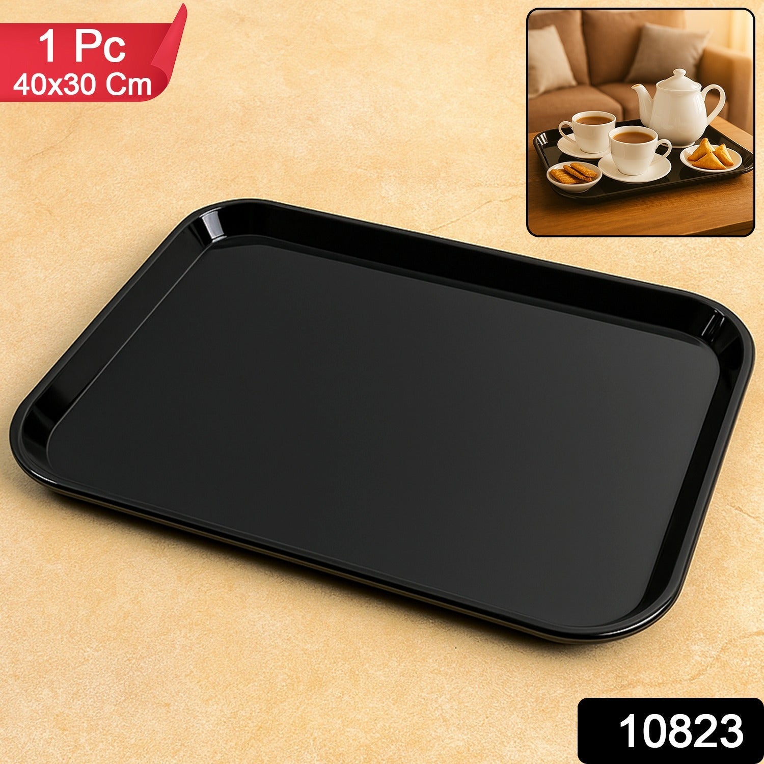 Close-up of black plastic serving tray showing raised rim for spill prevention