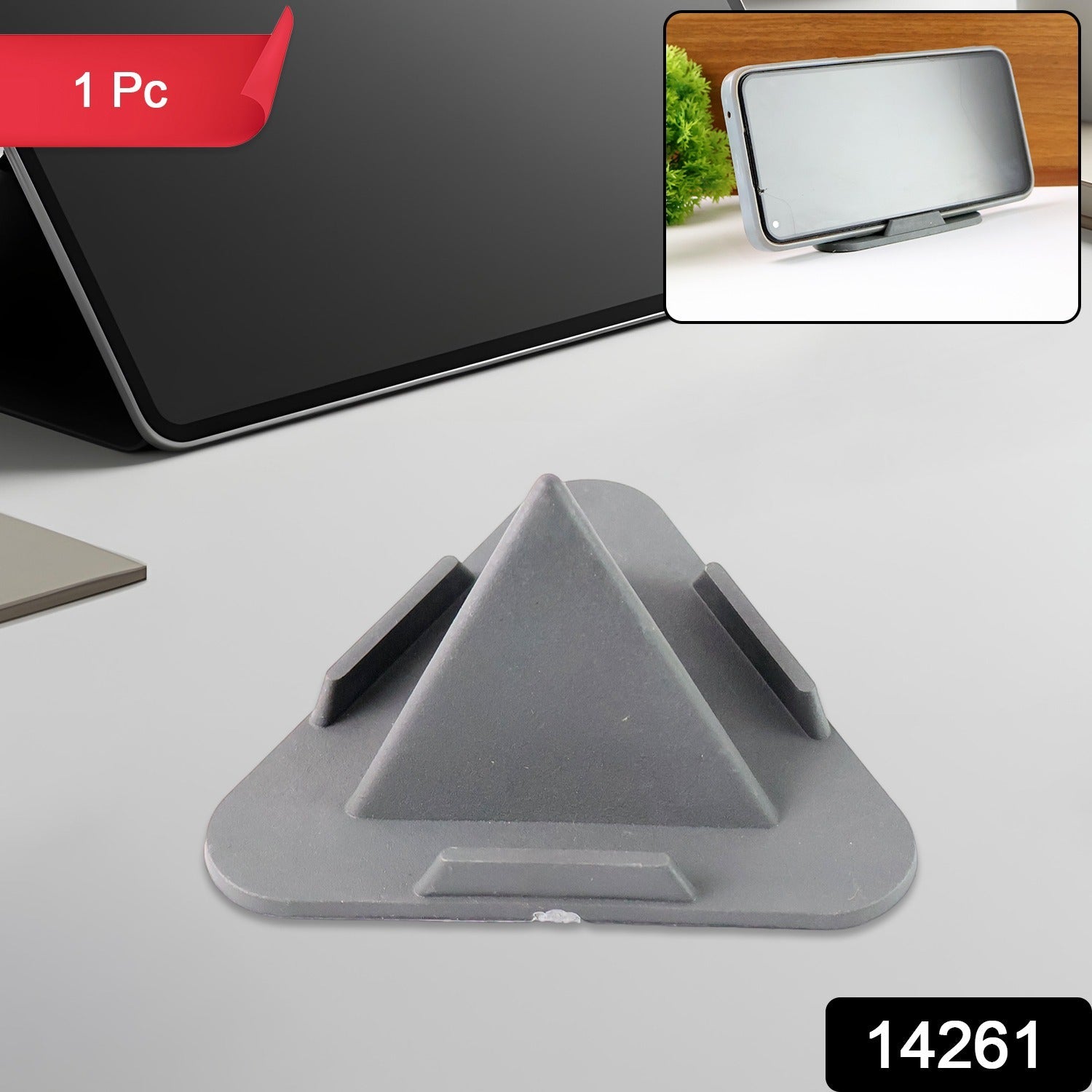 Side view of grey pyramid phone stand showcasing stability