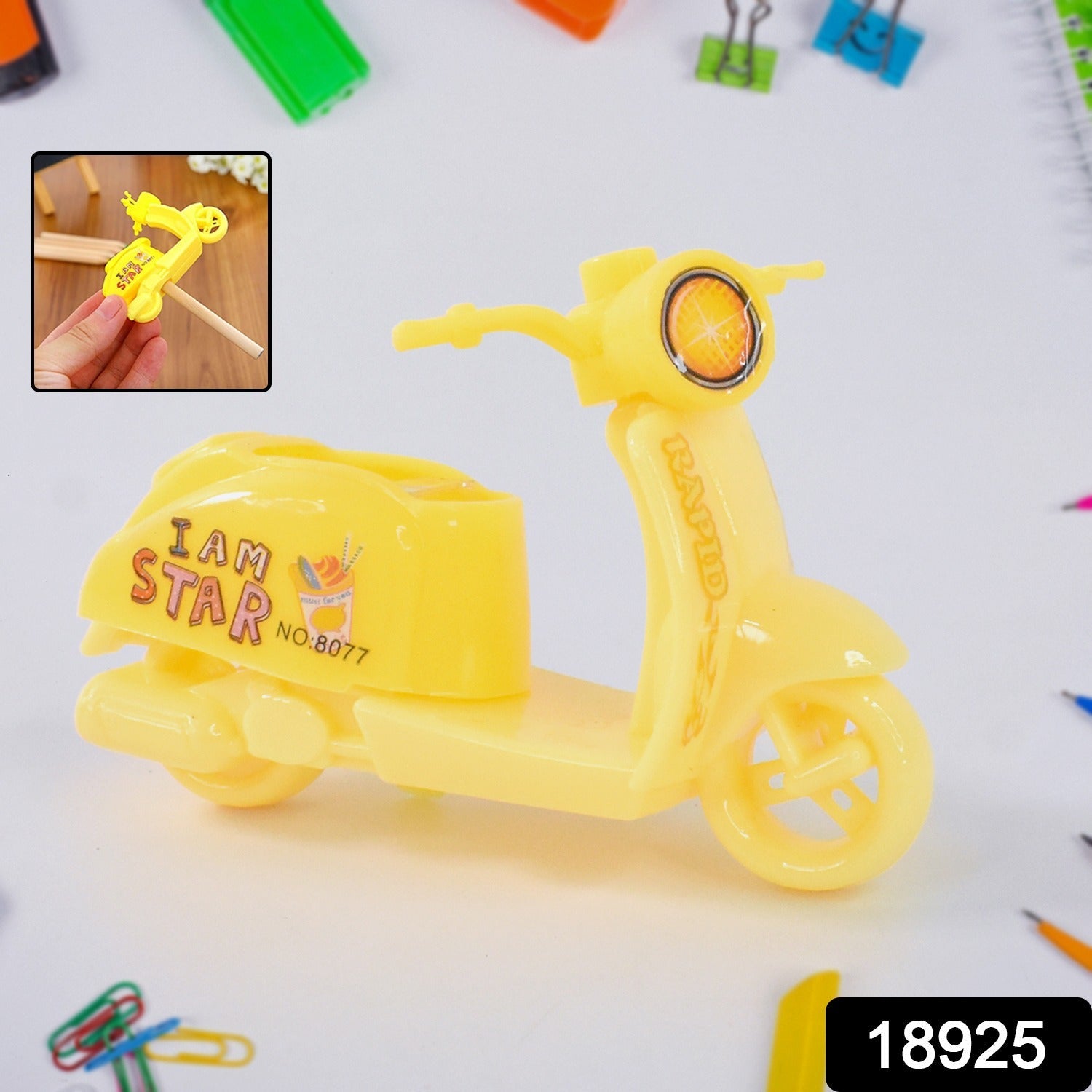 Bike shaped pencil sharpener on white background highlighting fun stationery accessory