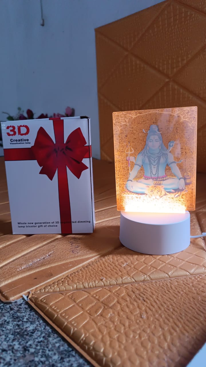 Lord Shiva LED night light illuminating a quiet room during meditation