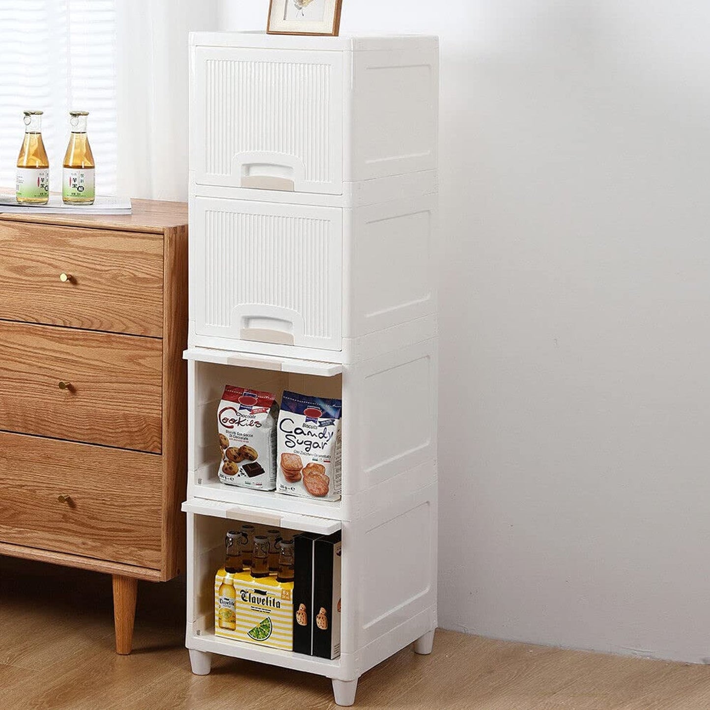 Front view of a 4-layer foldable storage cabinet with transparent plastic drawers.