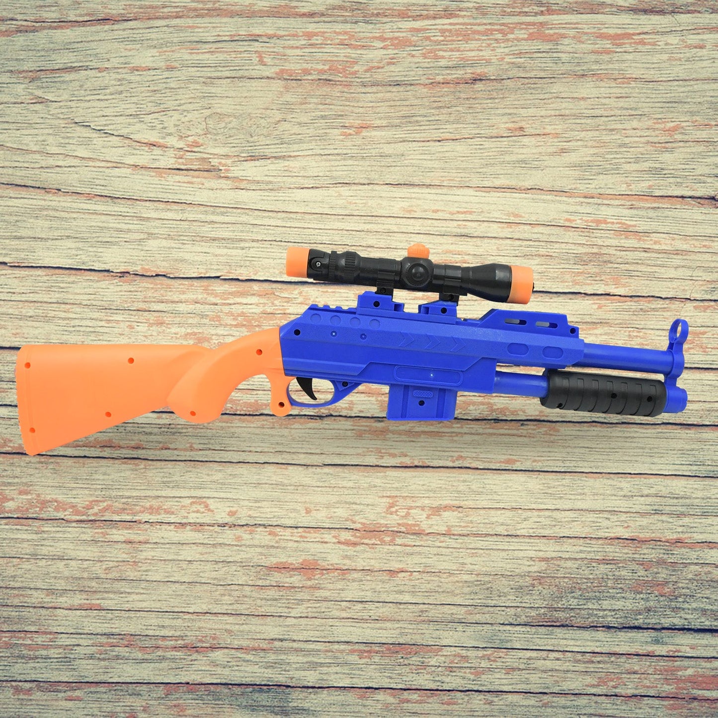 A child joyfully aiming the 22-inch toy gun for kids during outdoor play.
