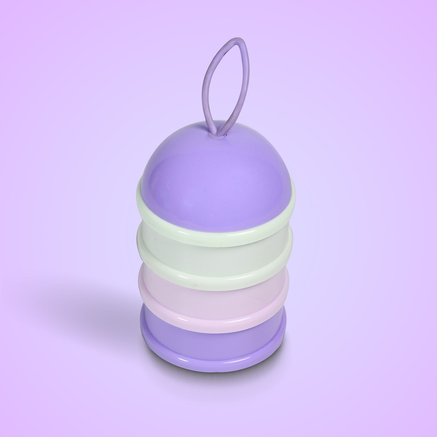 Close-up of the purple 3-layer baby food storage box, highlighting its secure lid.