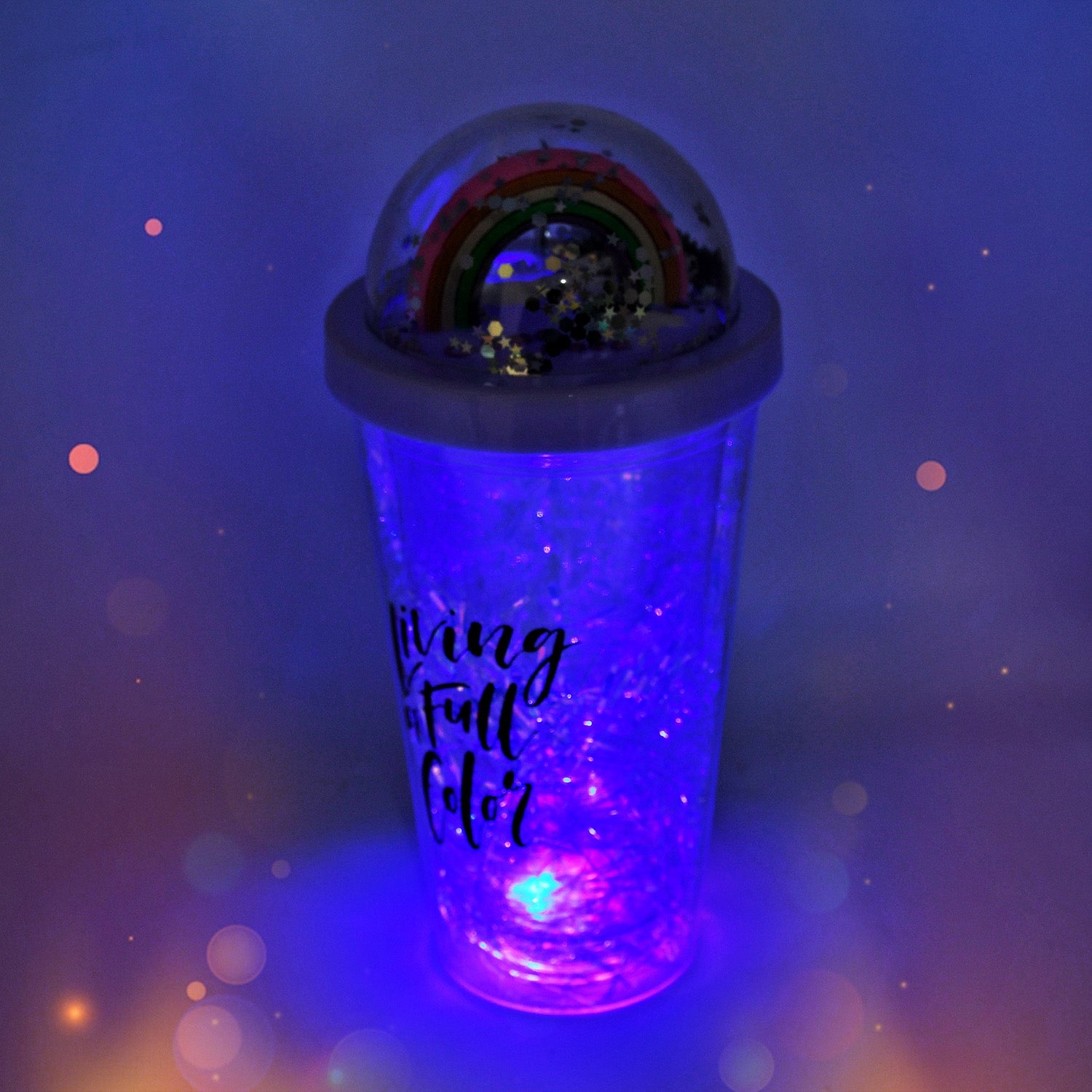 Front view of the BPA-free sipper bottle with a playful toy on top.
