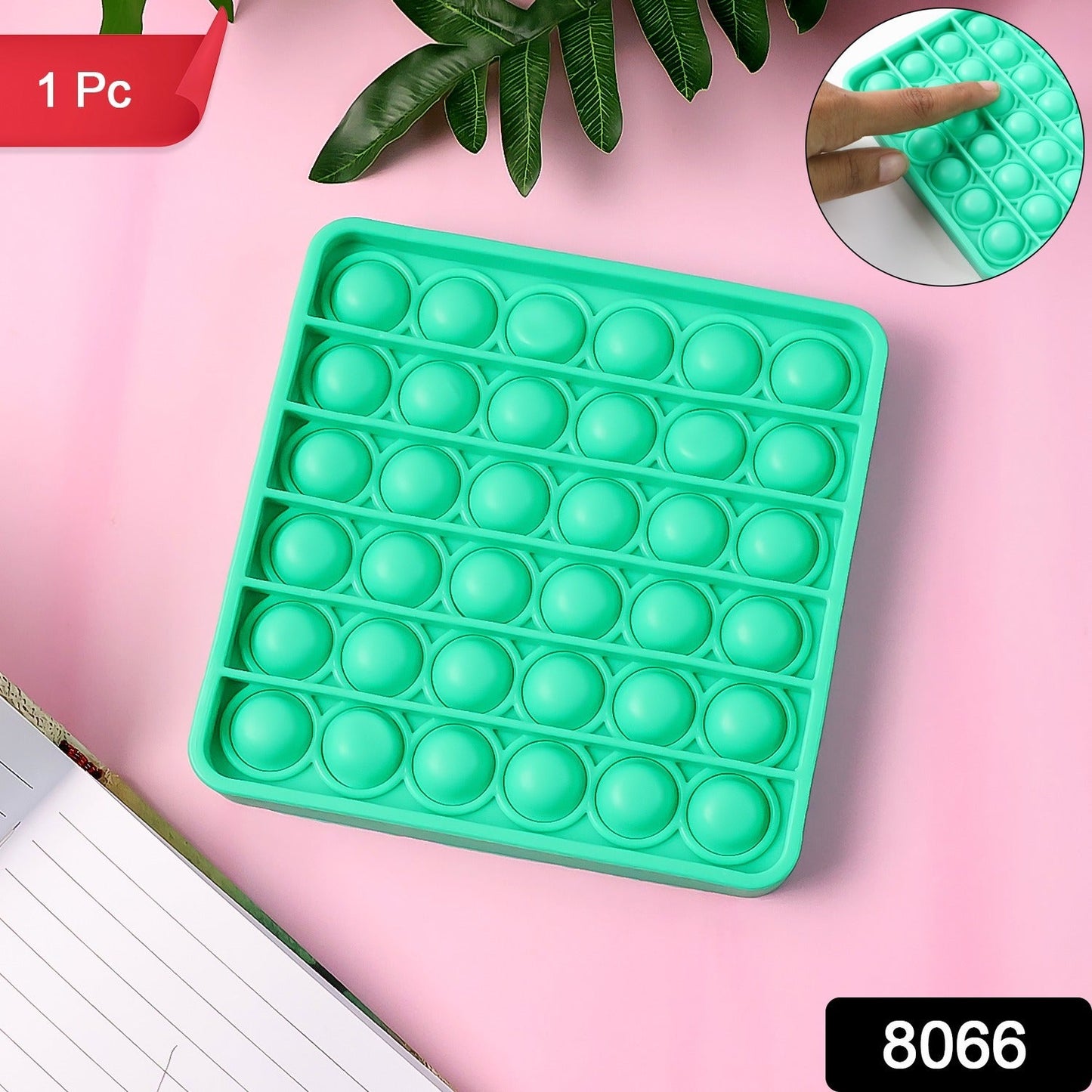 Silicone Pop It fidget toy on white background emphasizing sensory bubbles