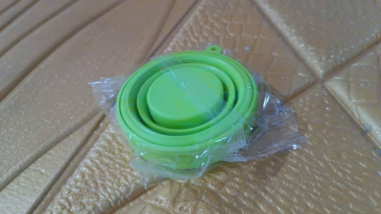 Portable foldable silicone travel mug, a single unit for daily adventures.