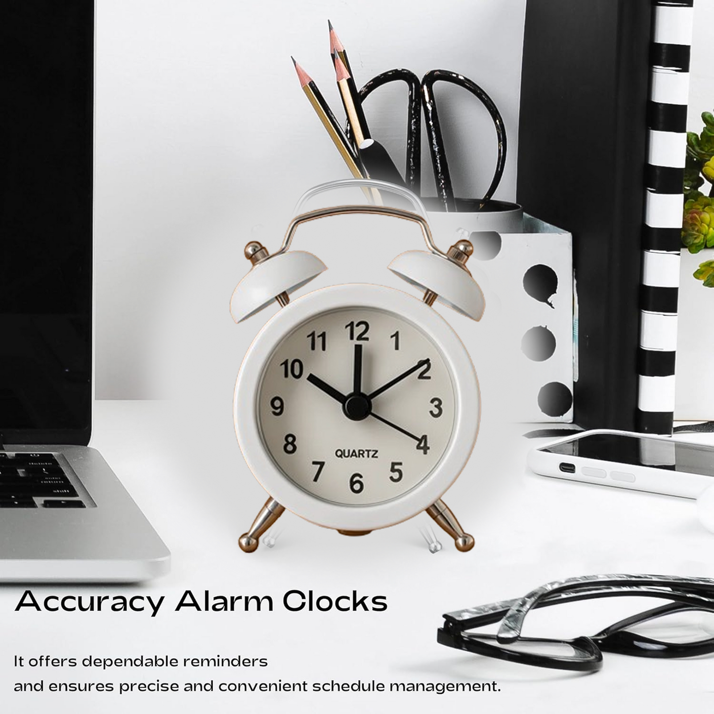 Front view of a compact retro twin-bell alarm clock.