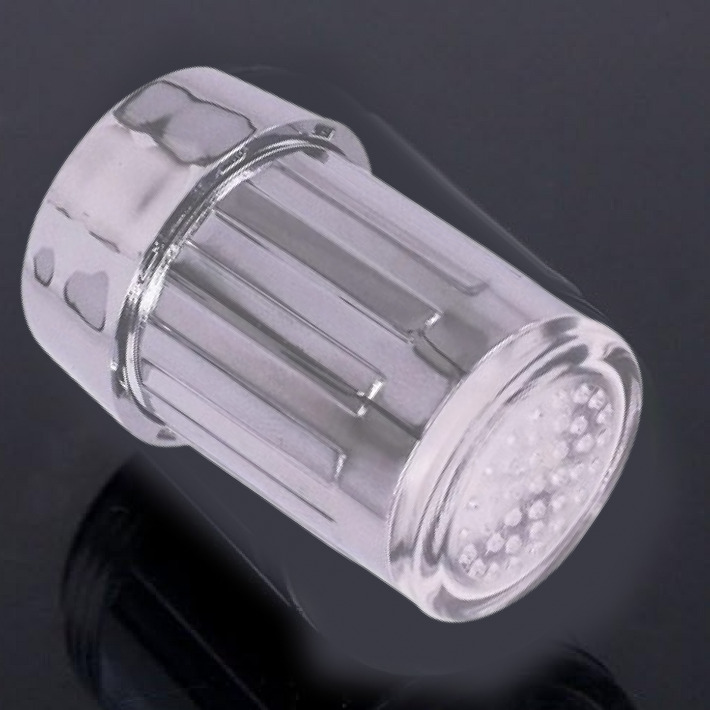 Luminous LED faucet tap adapter glowing brightly on water stream
