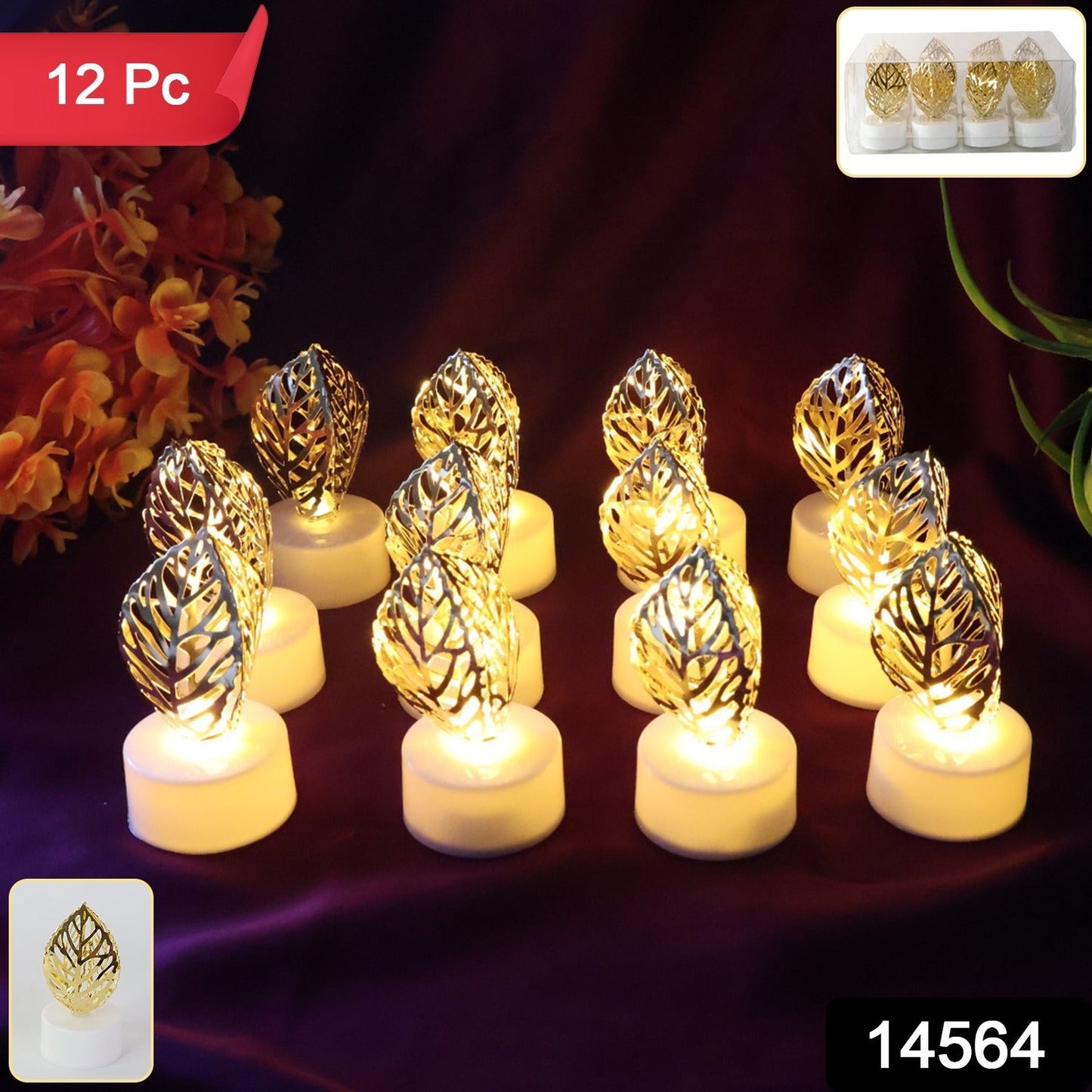 Close-up of golden leaf shaped LED candles flickering softly
