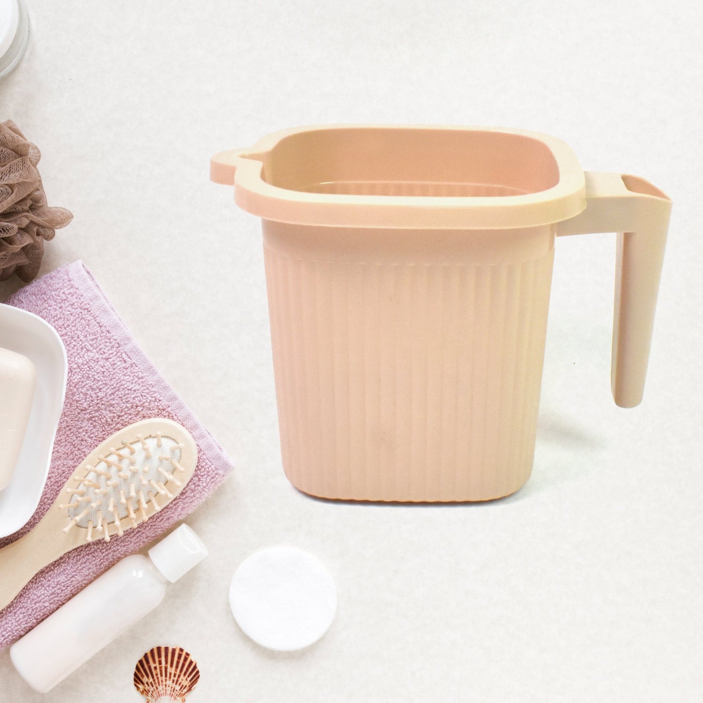 Clear Plastic Bath Mug on a plain background, highlighting its simple, functional design.