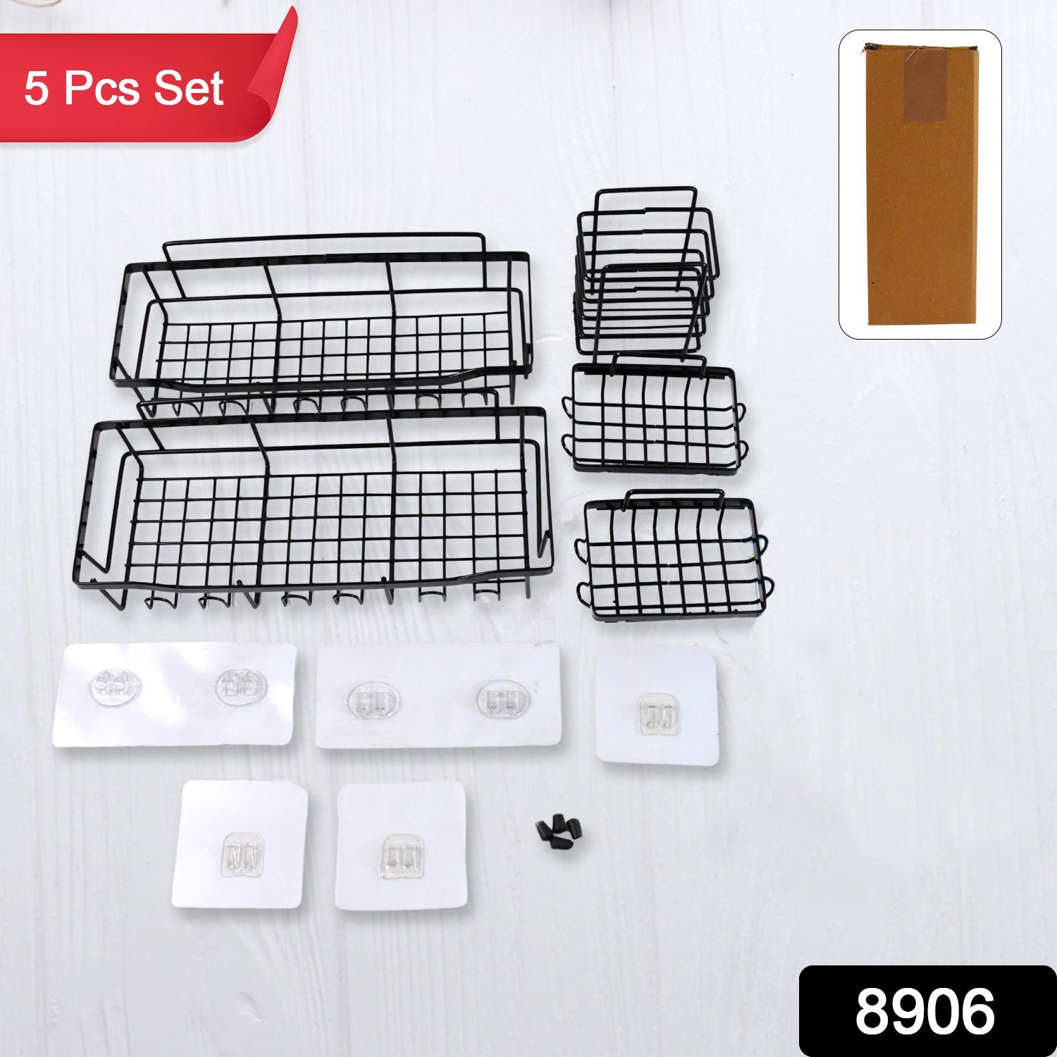 Black metal shower caddy hanging on shower arm holding bathroom essentials