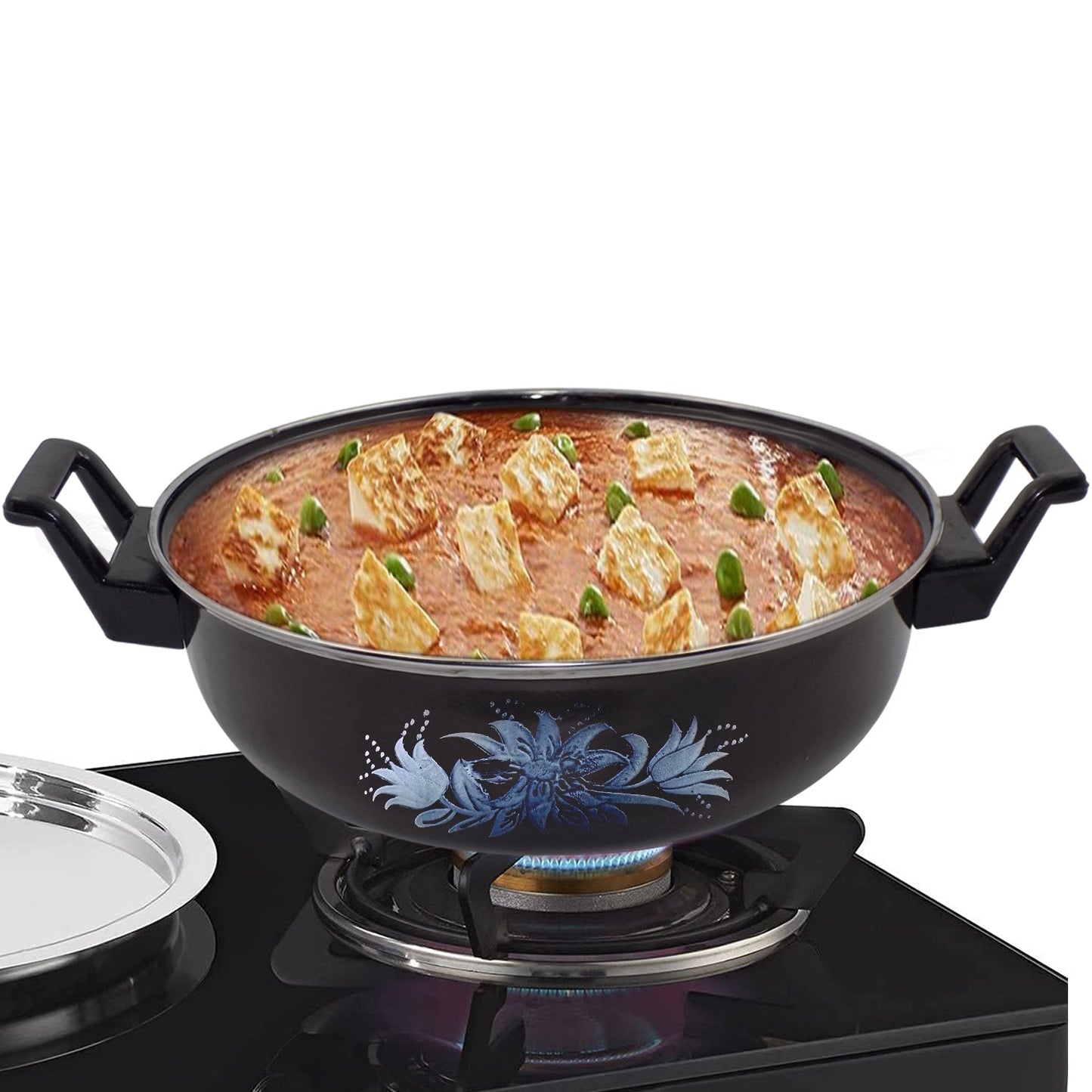 Traditional iron tava pan used for tempering spices