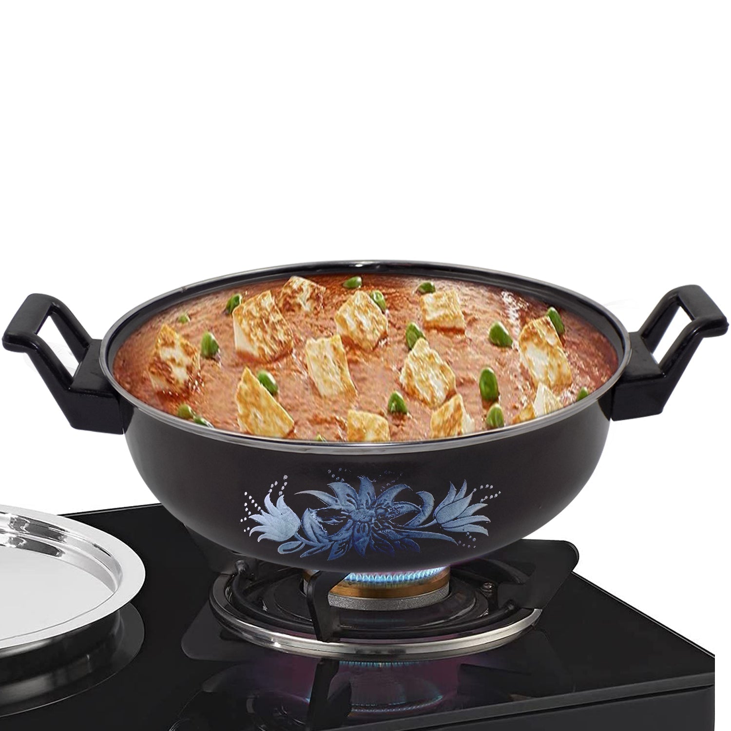 Traditional iron tava pan used for tempering spices