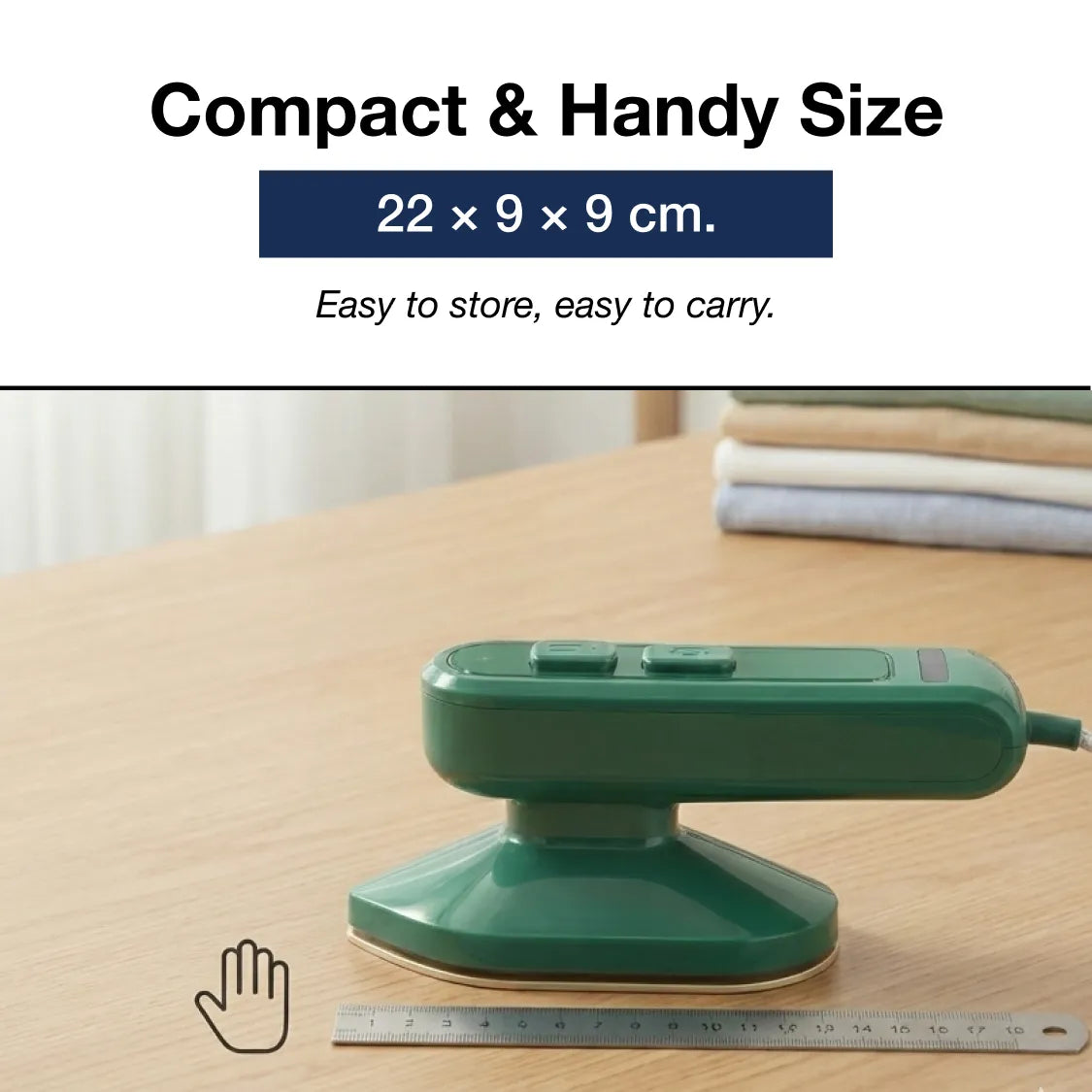Happy Bathers mini steam iron next to a hand for size reference, emphasizing portability.