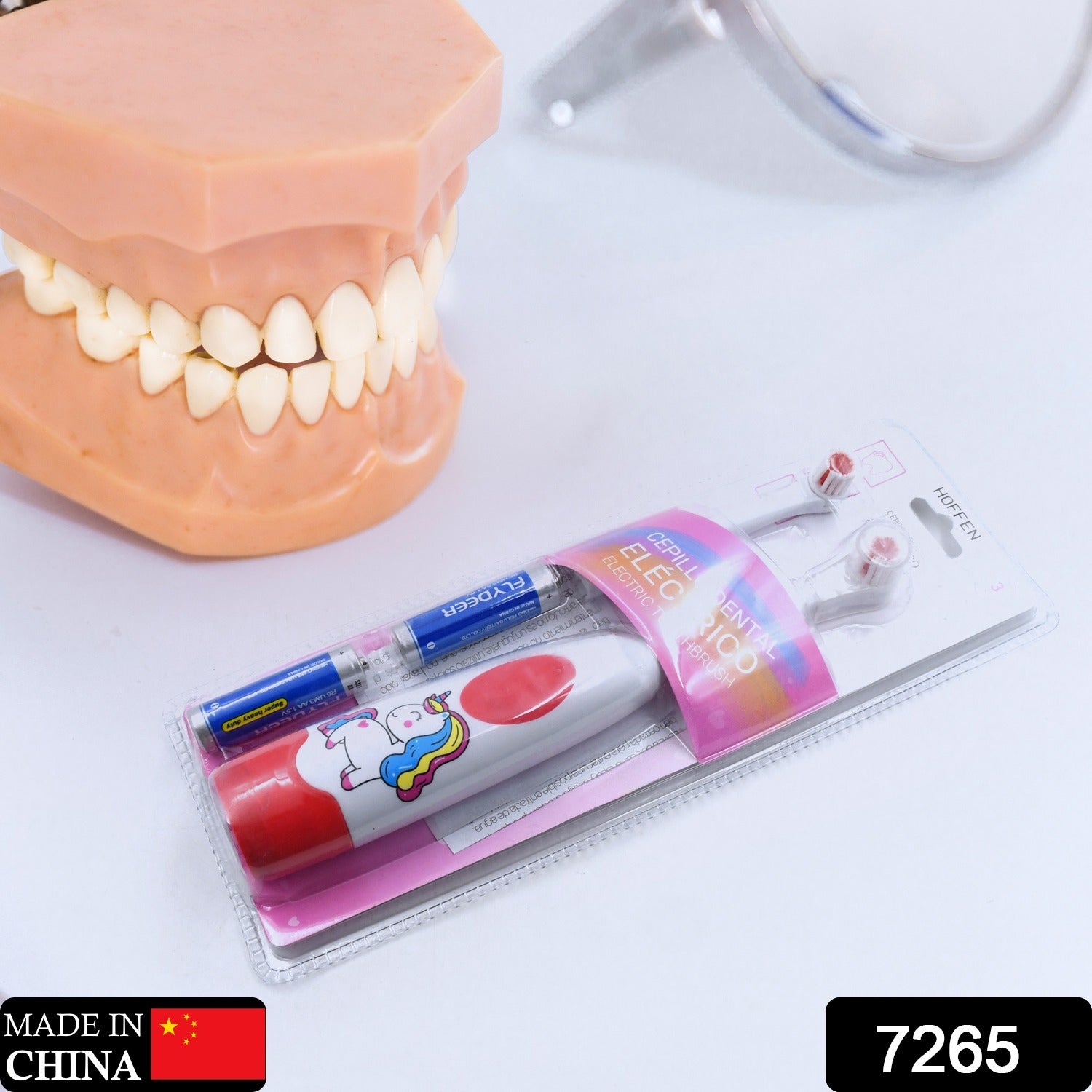 Travel electric toothbrush for adults and kids, shown with replacement head.