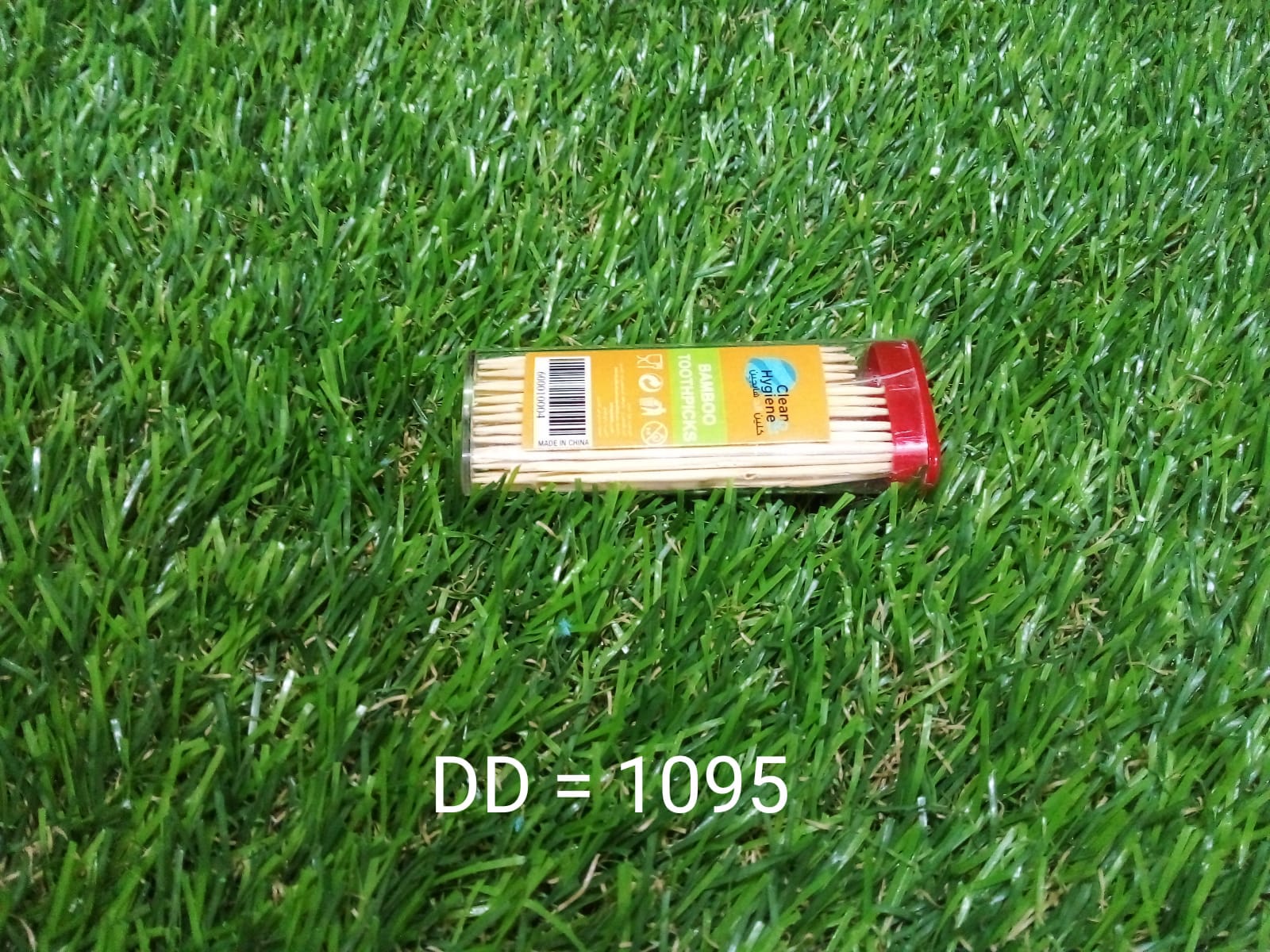 Hygienic bamboo toothpicks in their practical slide-out dispenser, ready for use.