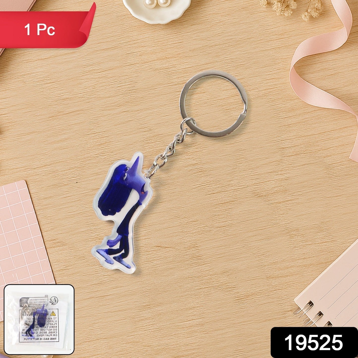 Close-up of glossy cartoon character acrylic keychain showing vibrant design