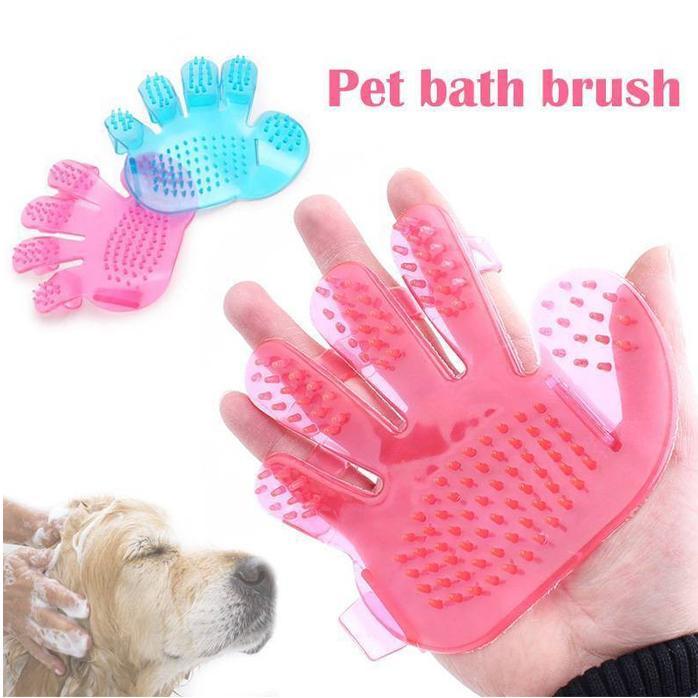 Pet grooming glove with soft rubber tips for fur removal and massage