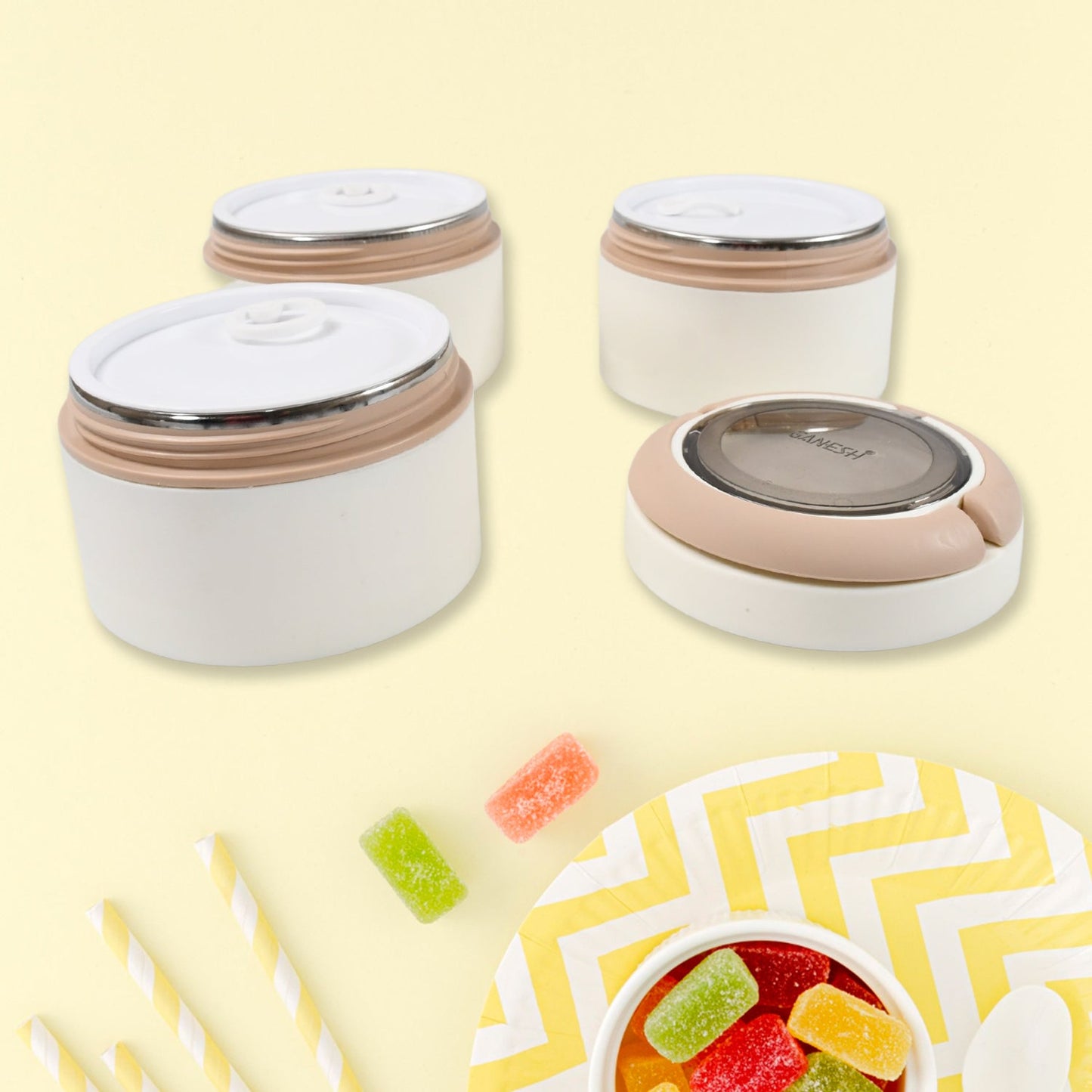 The Ganesh stainless steel lunch box on a table, ready for an office meal or school break.