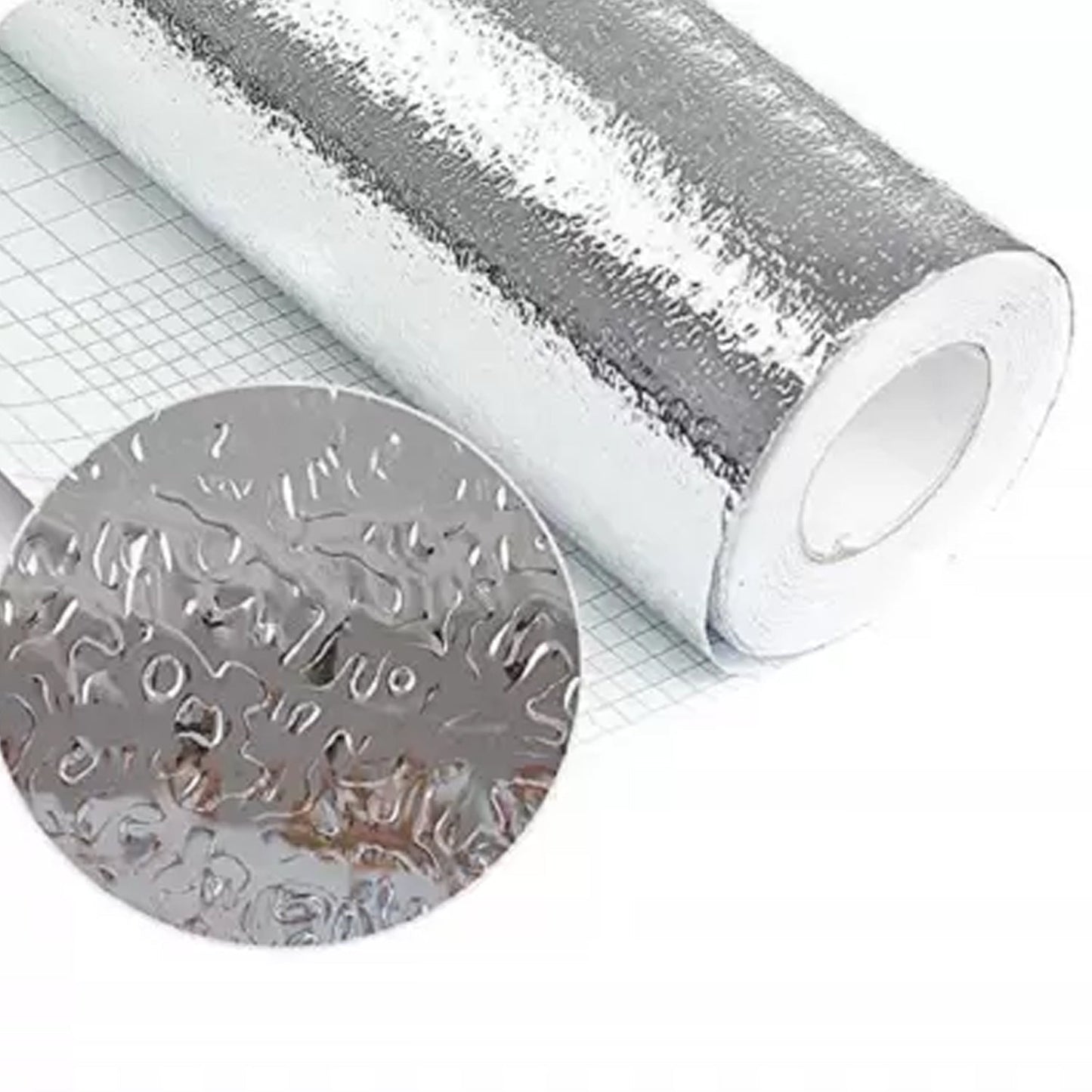 Aluminium kitchen foil applied to a kitchen drawer for protection.